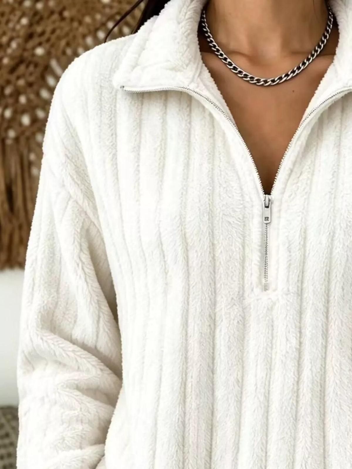 Quarter-zip sweatshirt, collar and zipper detail