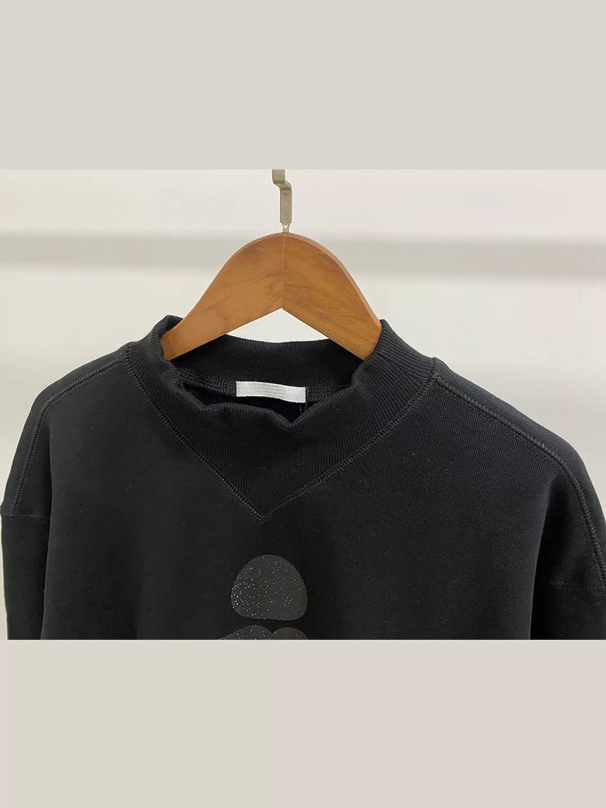 Black v-neck dropped shoulder graphic sweatshirt