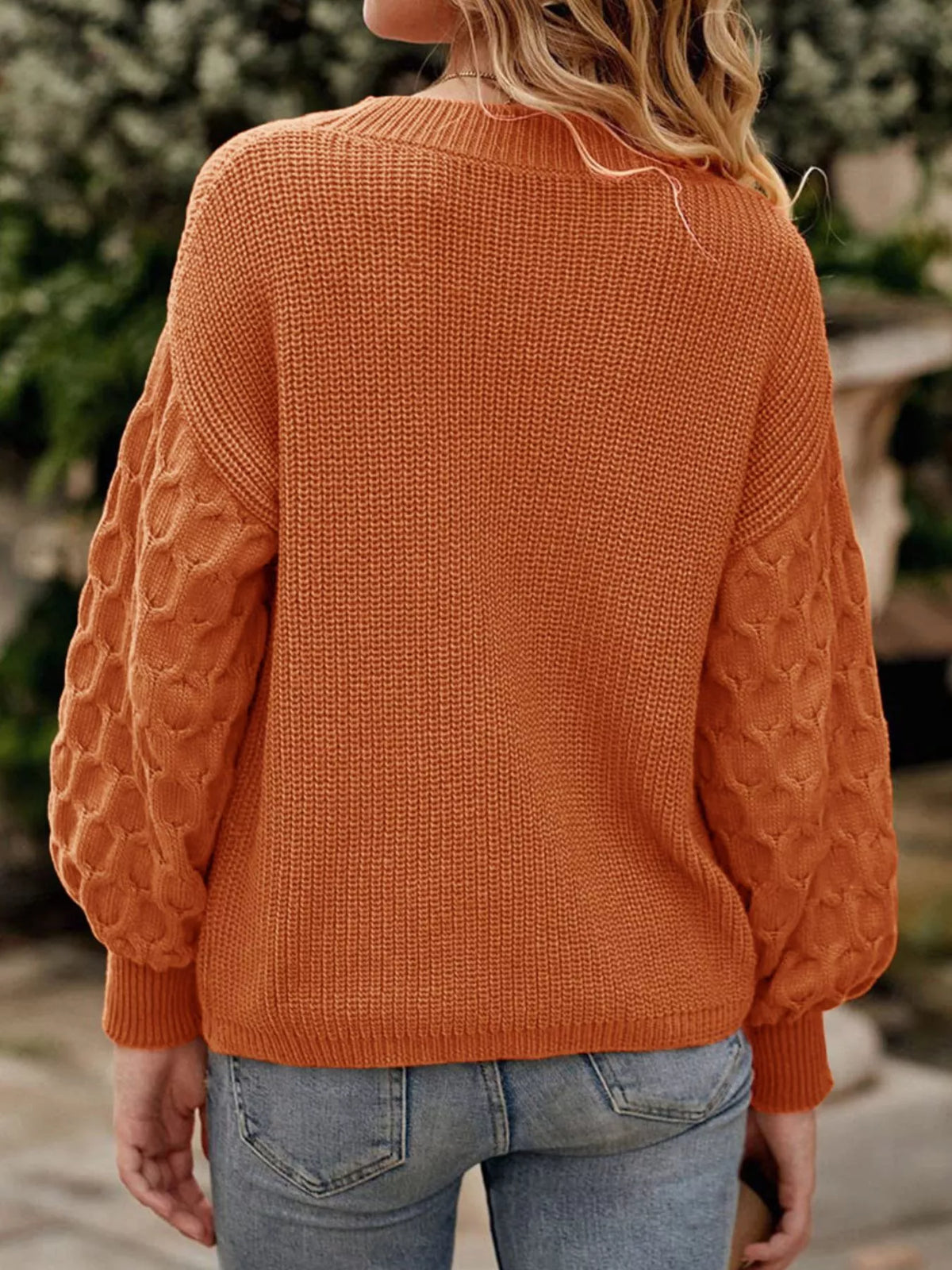 Textured Sleeve Round Neck Sweater in orange, back view
