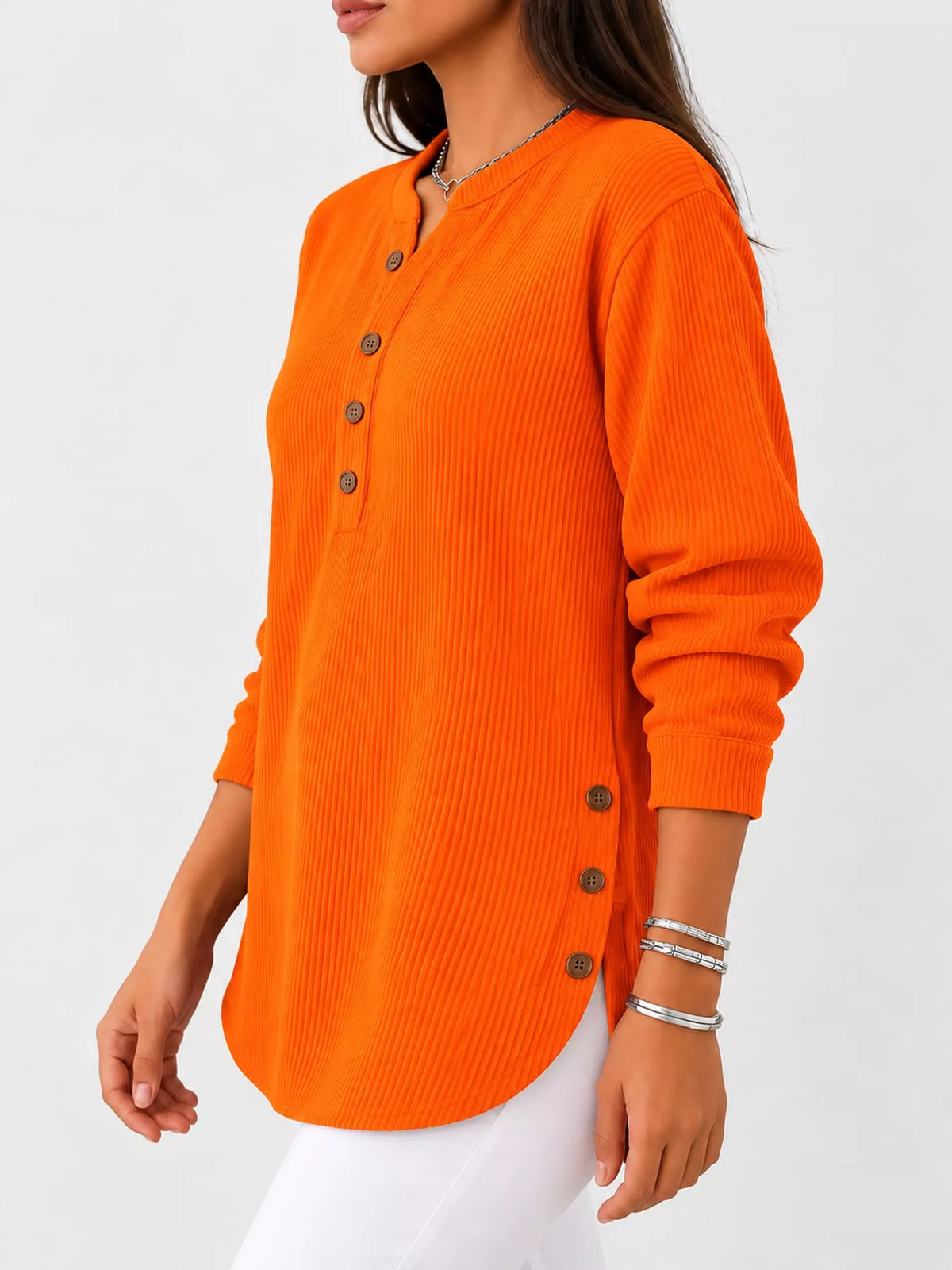 Orange button detail long sleeve top, side view