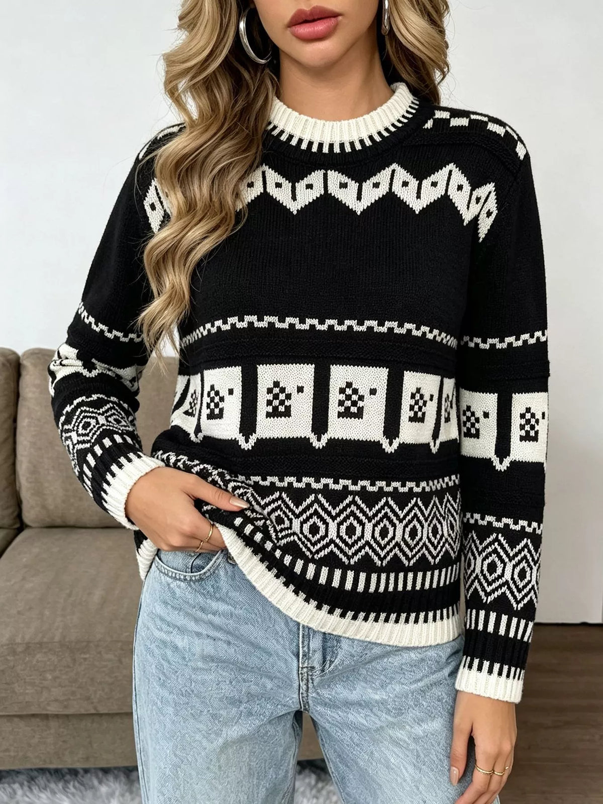 Black and white christmas fair isle crewneck sweater, front view.
