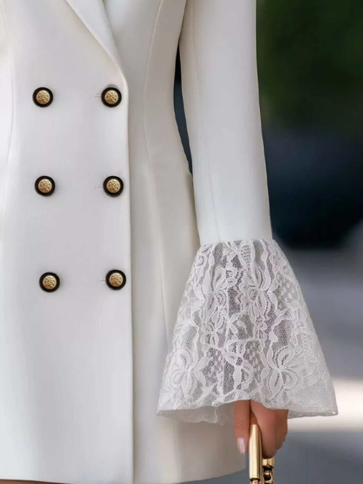White double-breasted blazer dress with lace flare cuffs, detail view