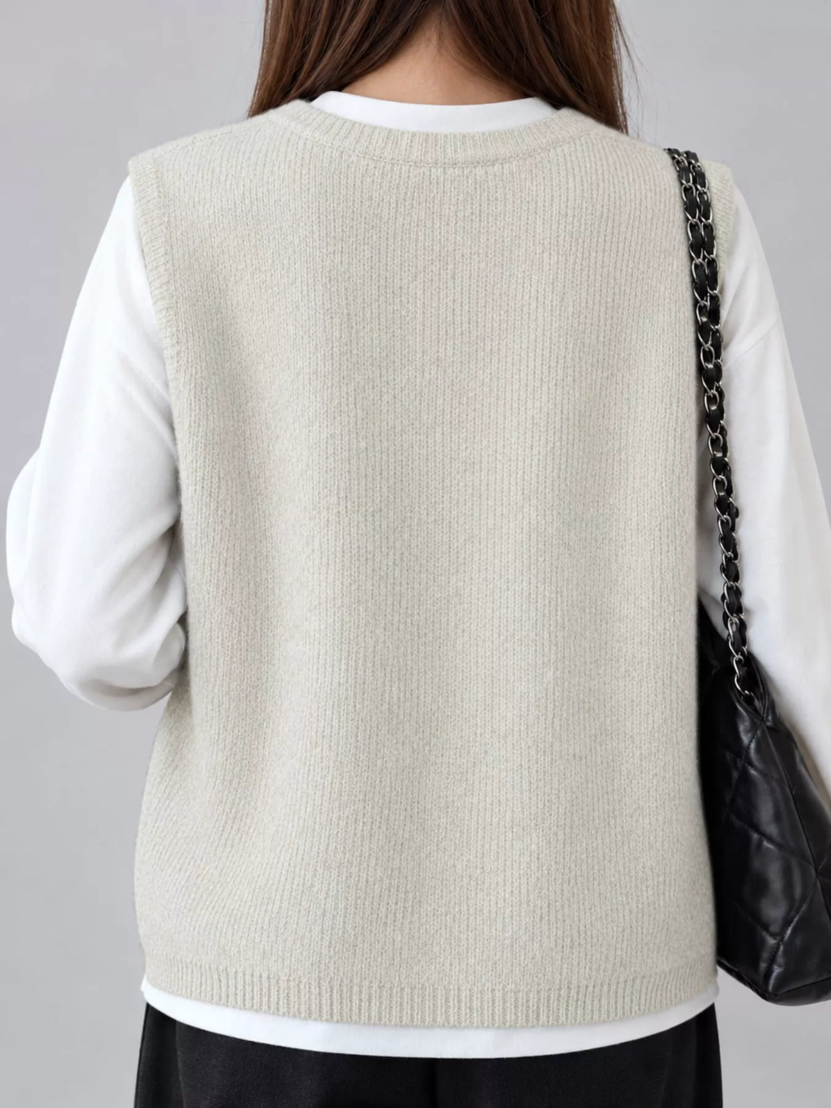 Sleeveless sweater vest, back view
