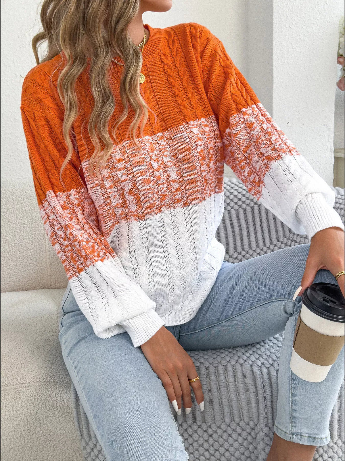Orange colorblock cable knit round neck sweater