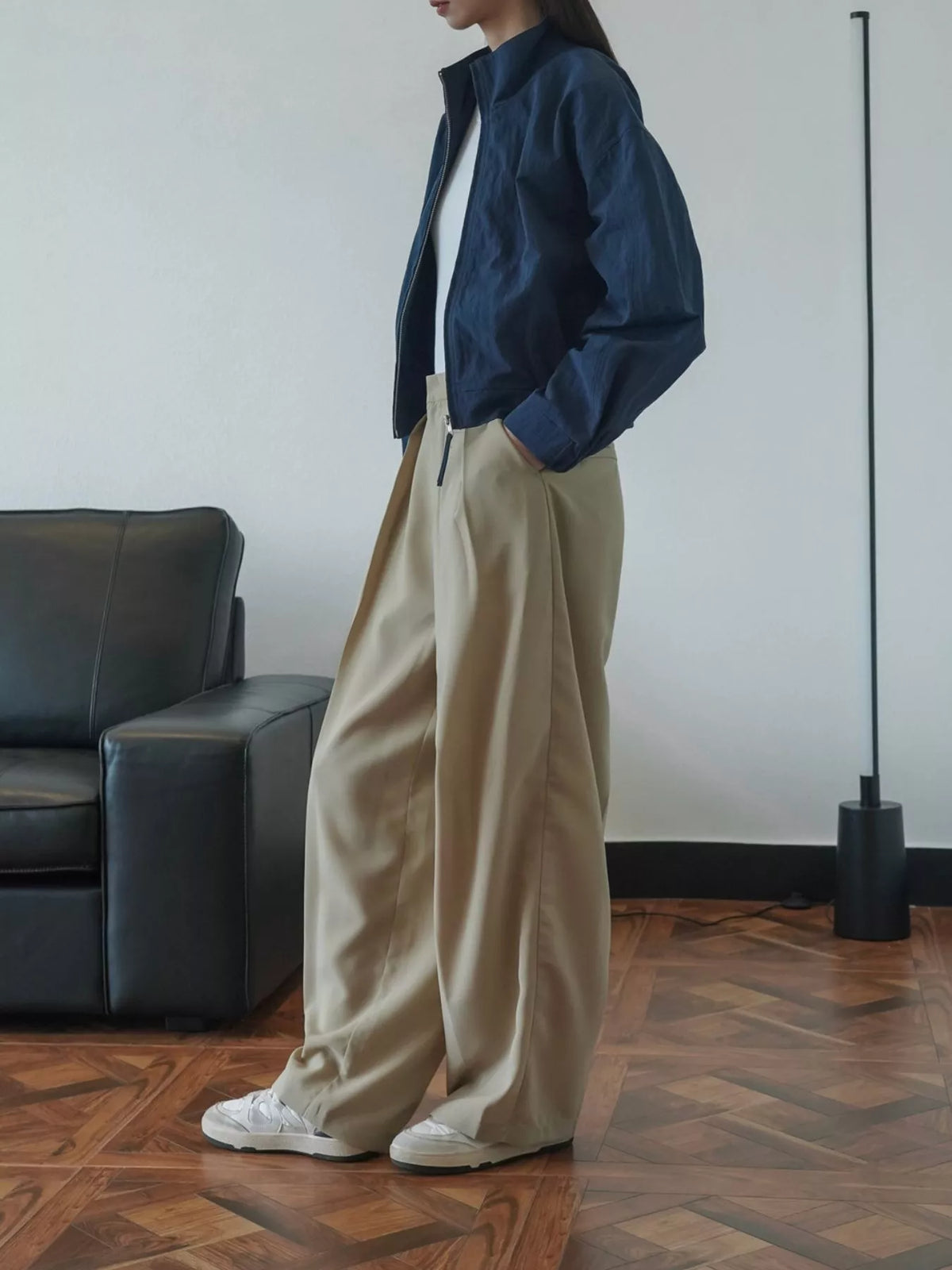 Women's High-Waisted Pleated Wide-Leg Pants in beige — side view