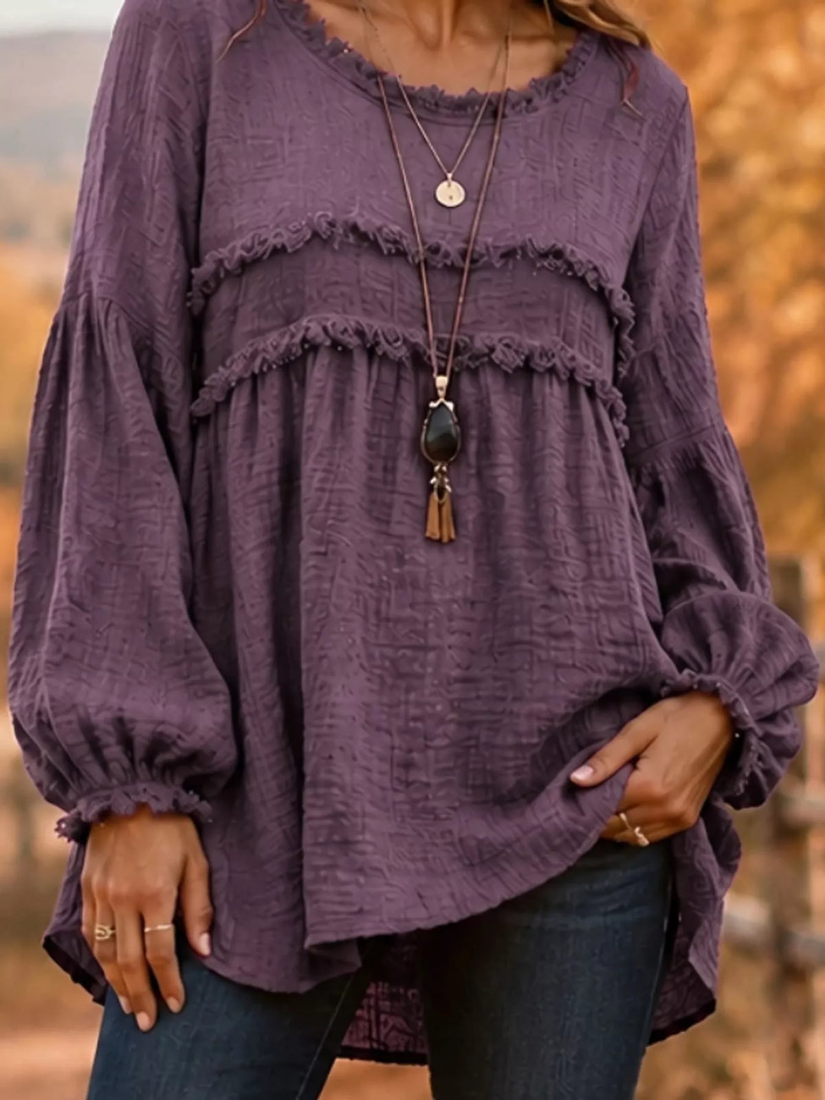Purple textured frayed-trim peplum blouse