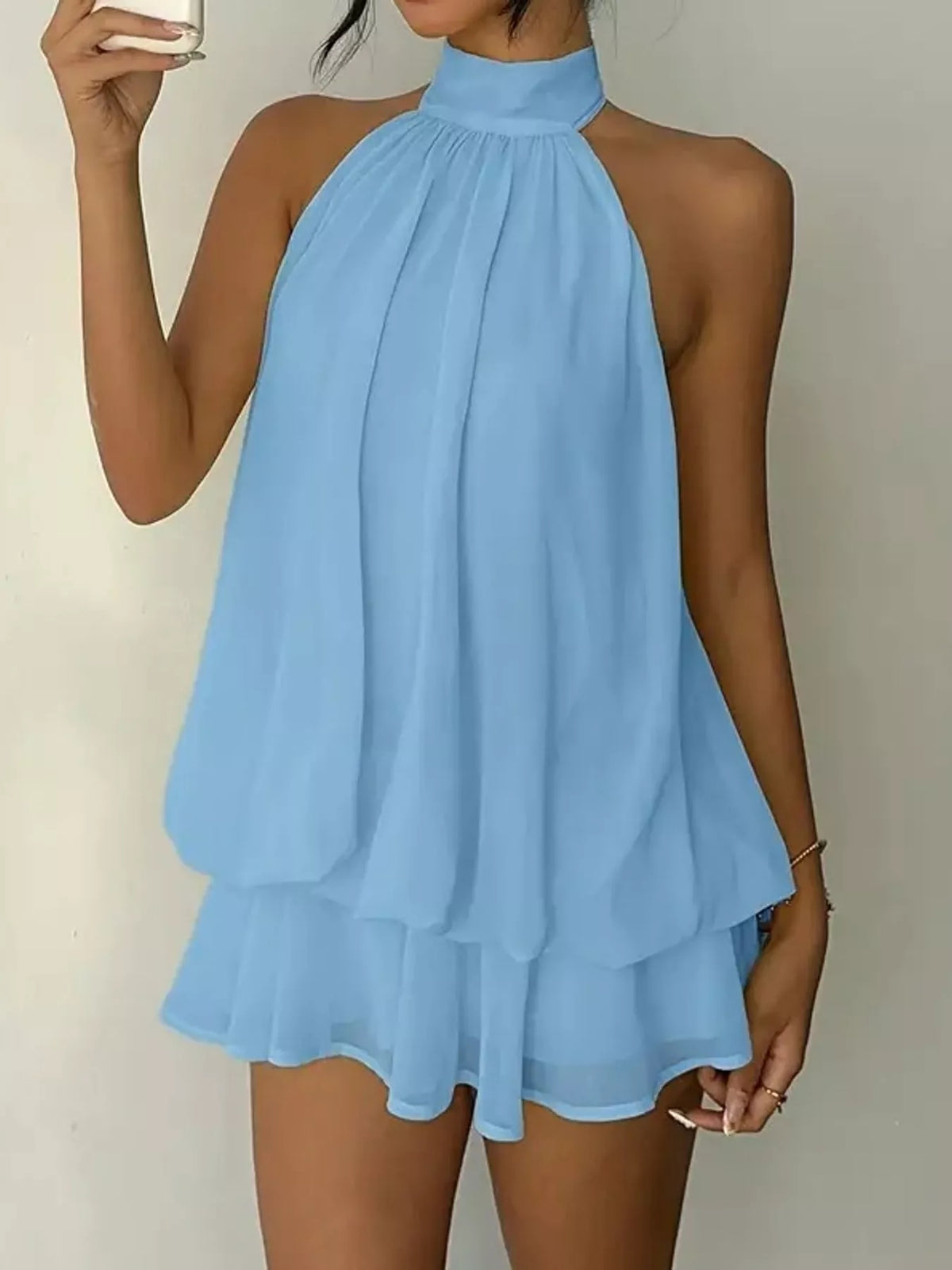 Blue halter neck layered mini dress, front view