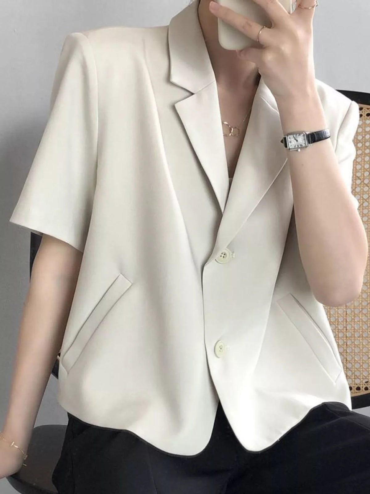 Collared short sleeve blazer, side view