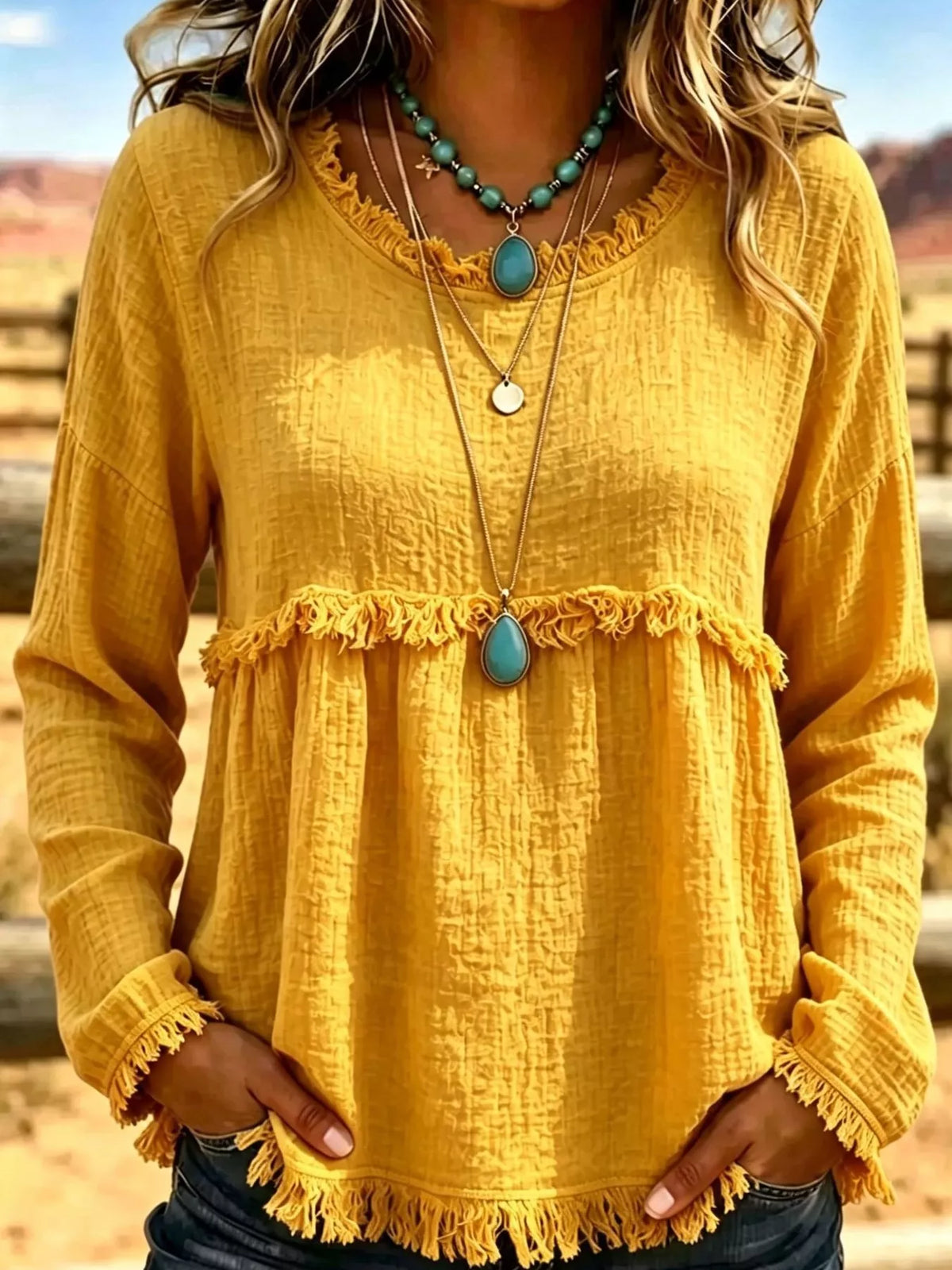 Yellow frayed hem textured blouse, front view