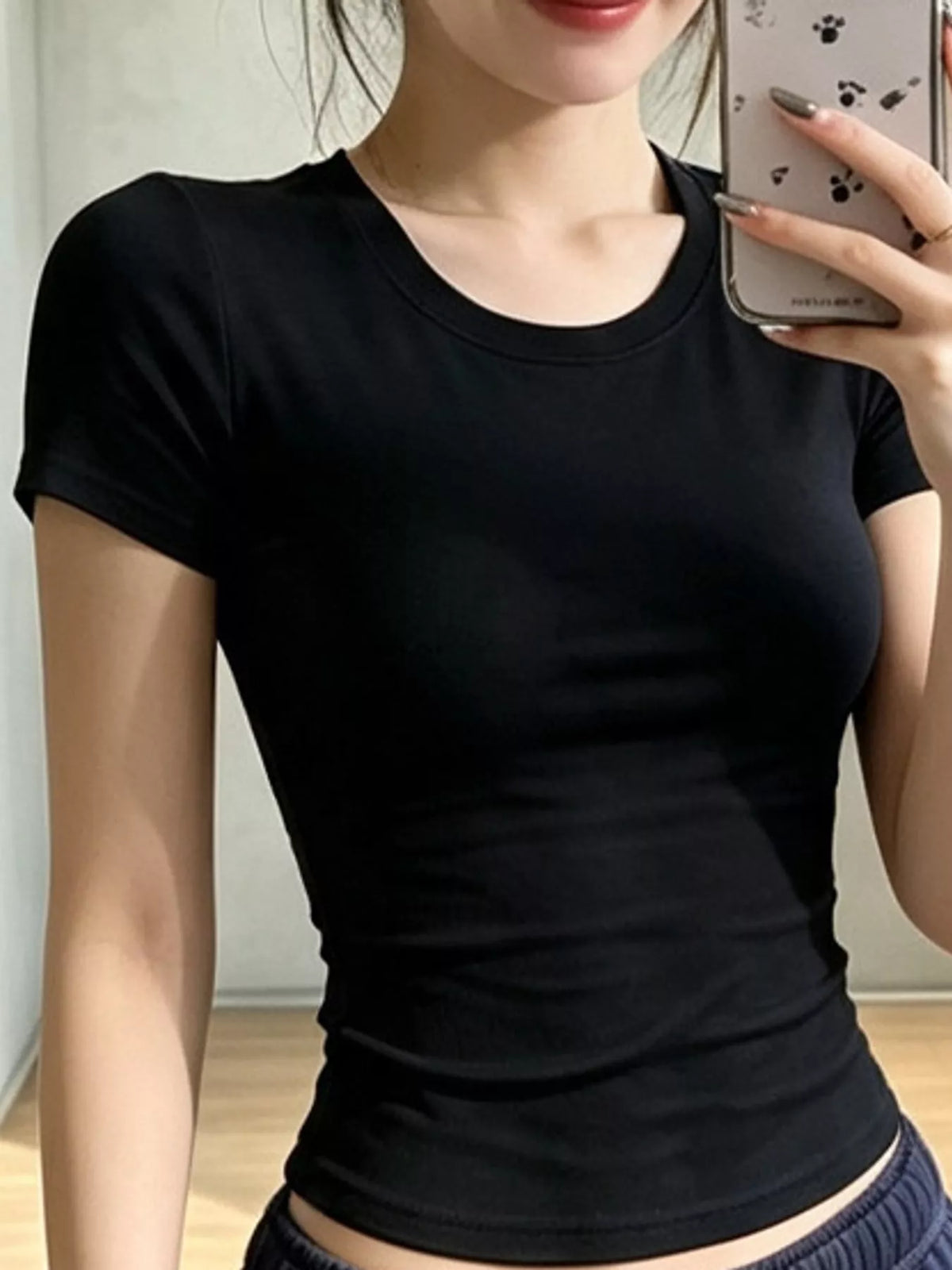 Black slim-fit crew neck T-shirt, front view