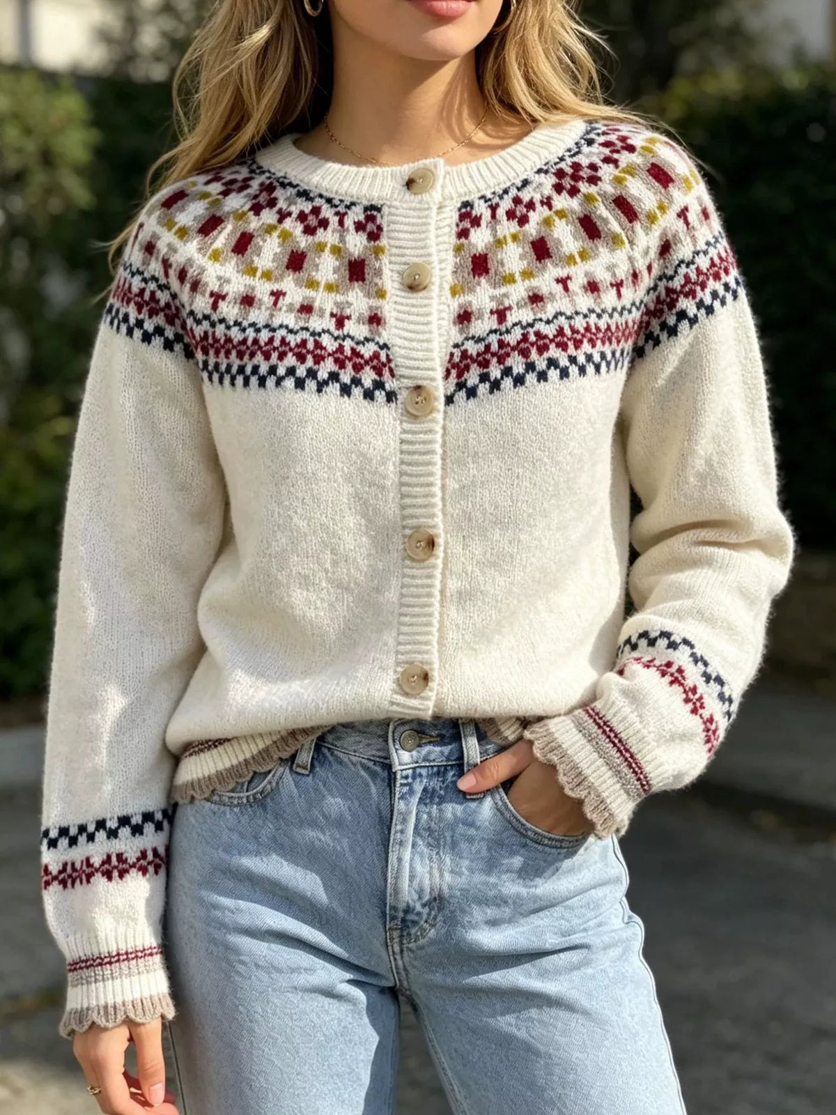 Cream fair isle button-front knit cardigan, angled front view.