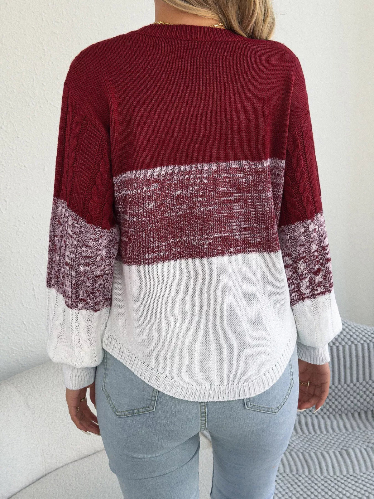 Burgundy color block cable knit sweater, back view