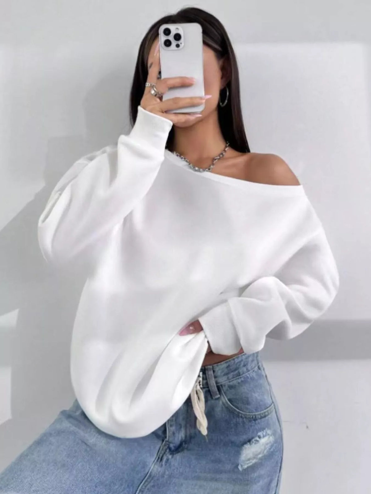 White asymmetric-neck sweatshirt, front mirror view