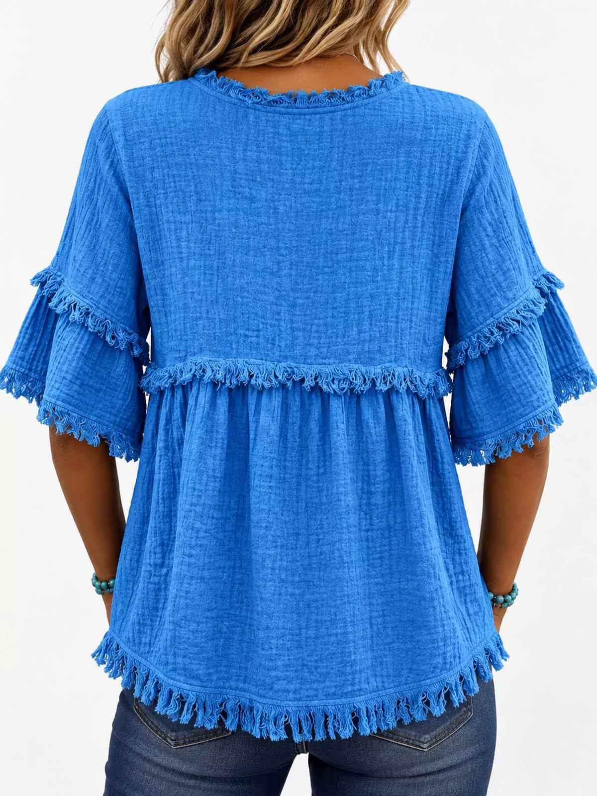 Blue frayed edge textured blouse, back view