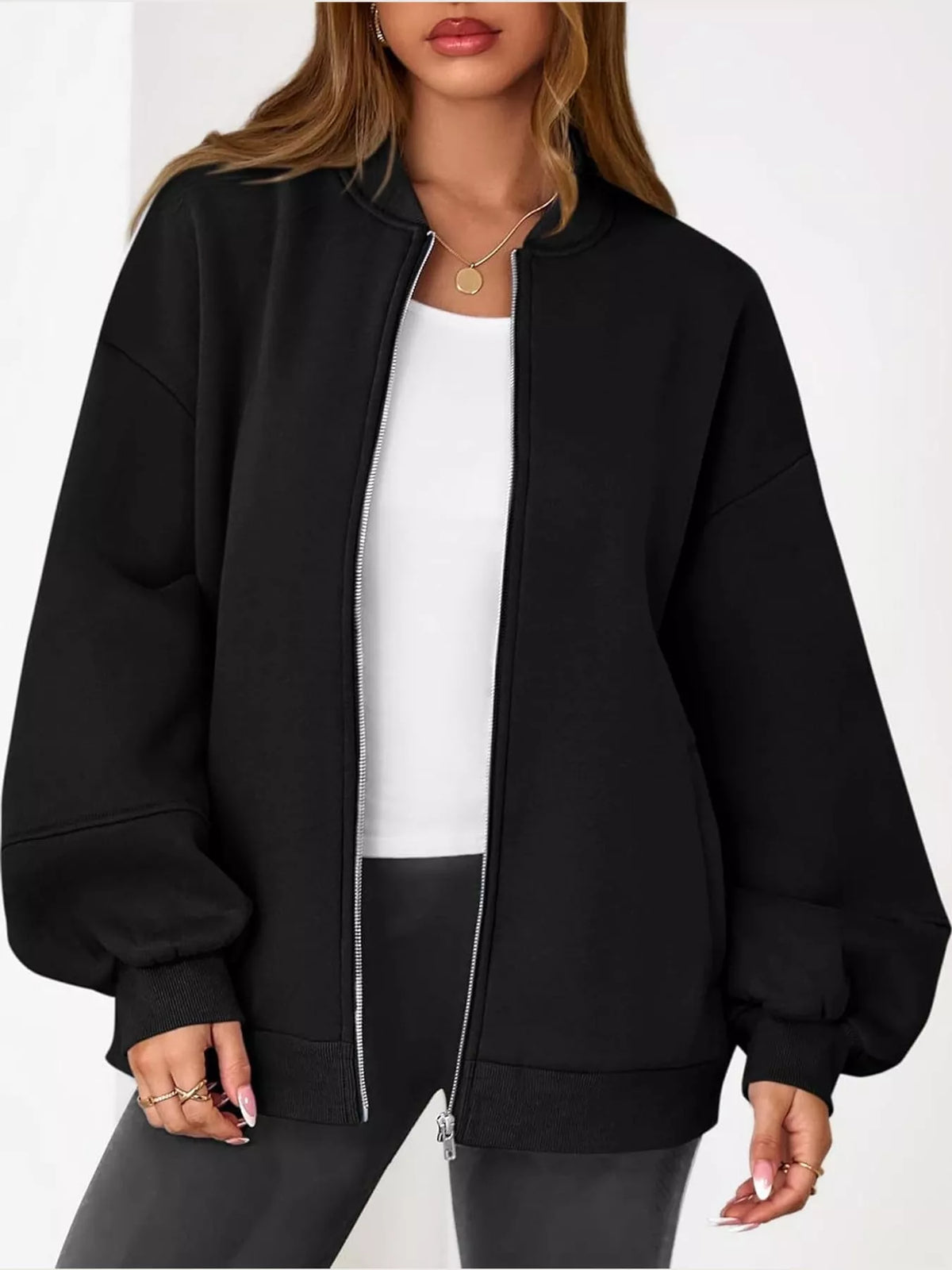 Black oversized zip-up jacket — front view