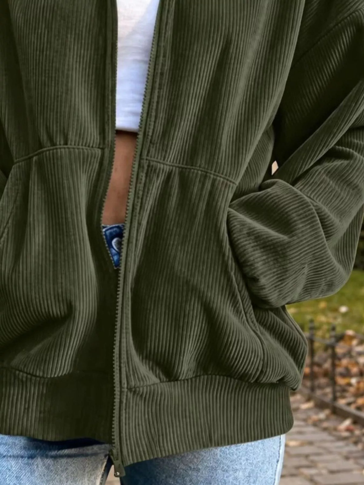 Olive green corduroy zip-up jacket, patch pocket and cuff detail