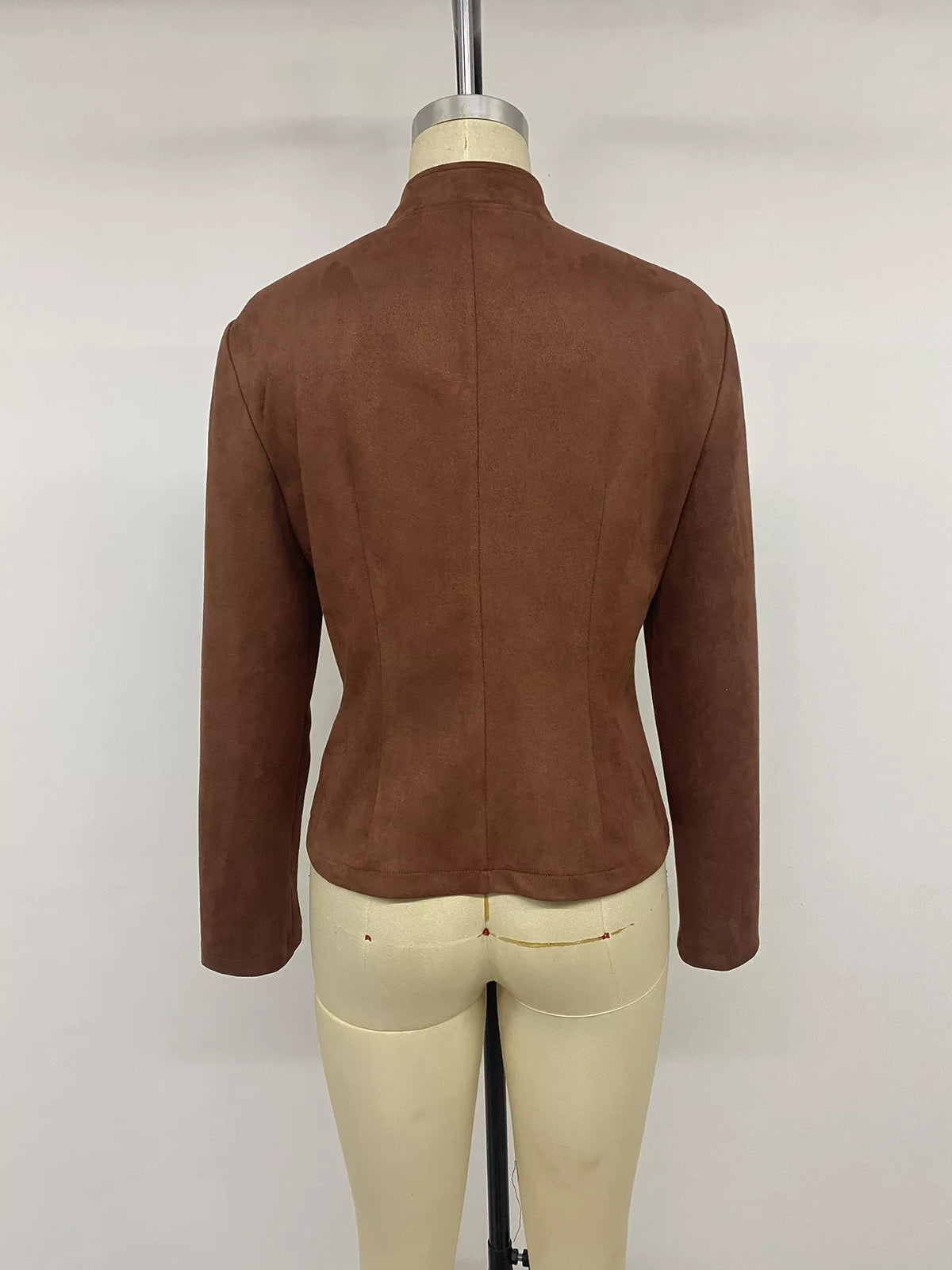 Brown stand collar cropped jacket with decorative buttons, back on mannequin