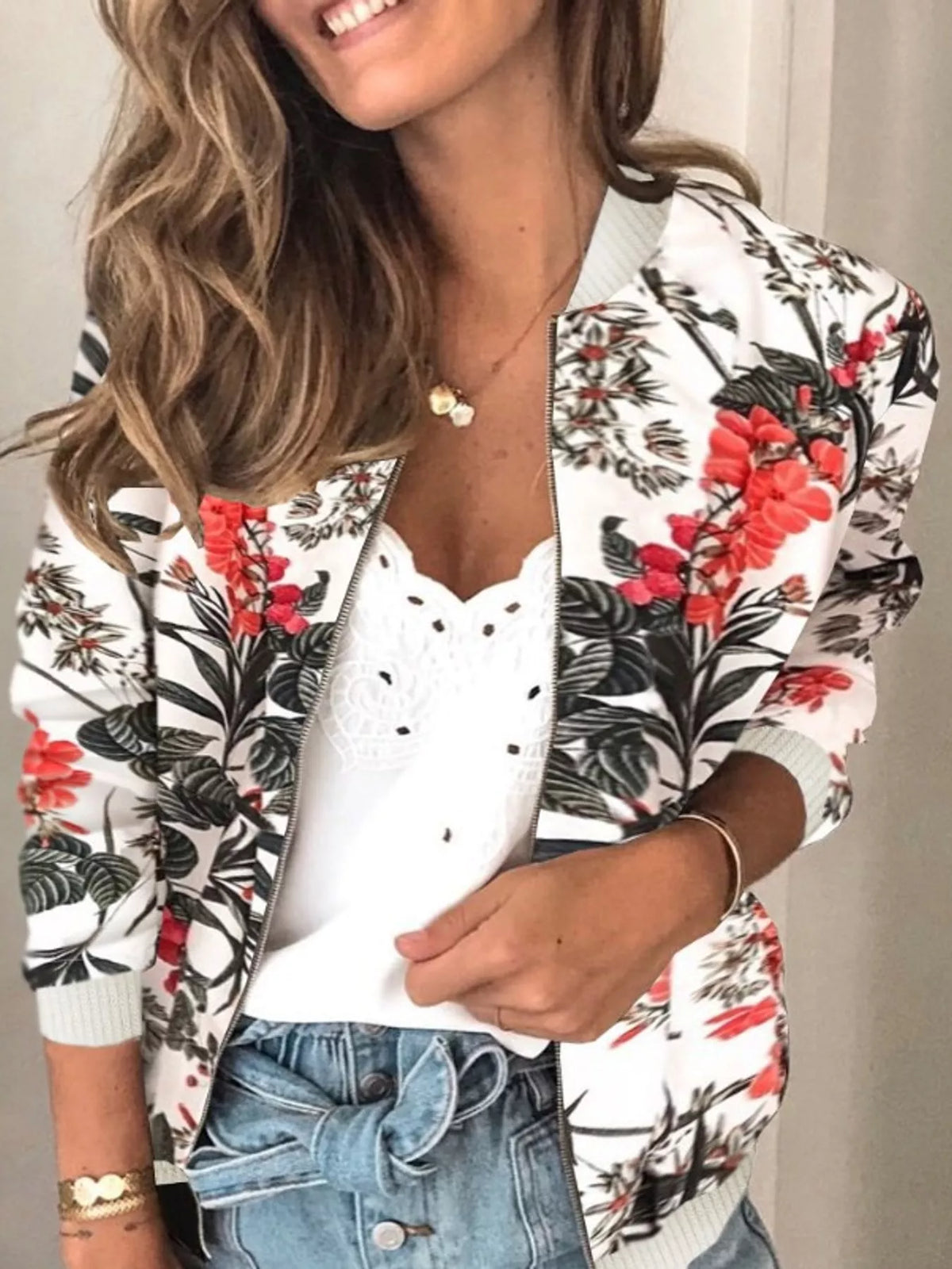 White and red floral printed zip-up bomber jacket — front view