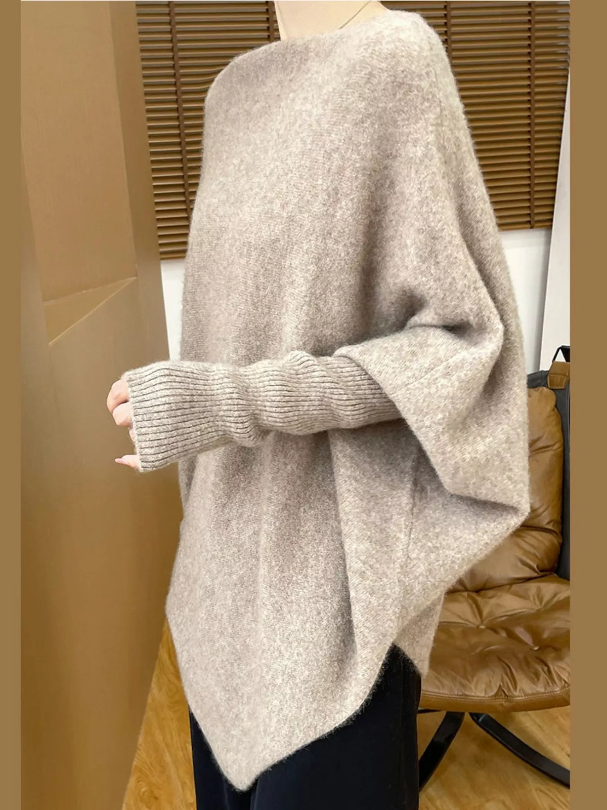 Taupe asymmetrical lantern sleeve sweater — side view