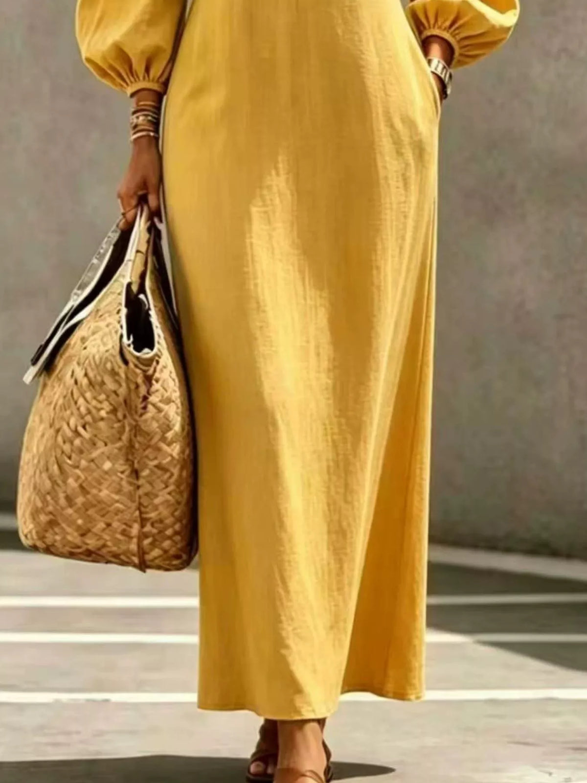 Yellow balloon-sleeve maxi dress, skirt detail