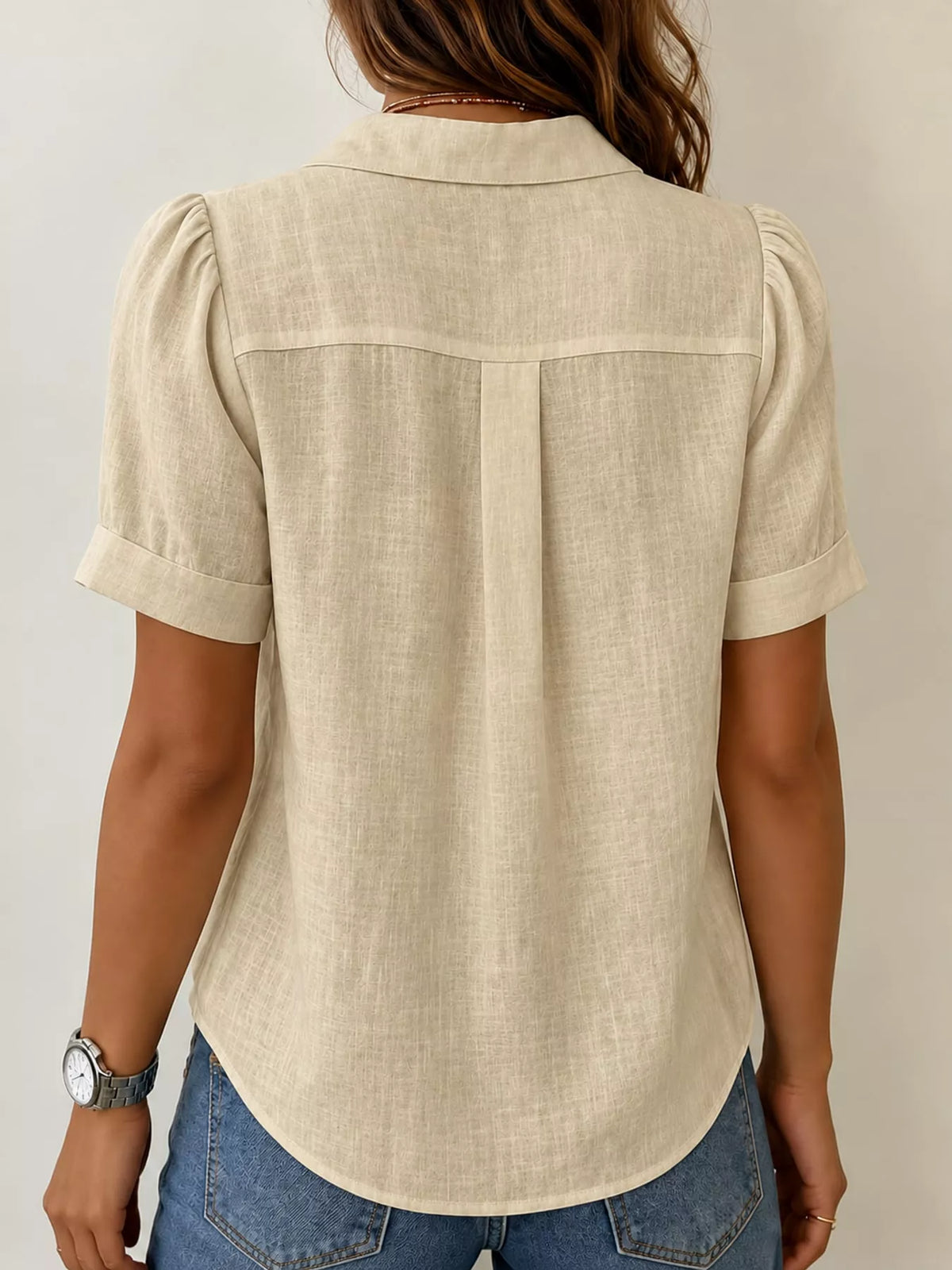 Khaki button up short sleeve shirt, back view