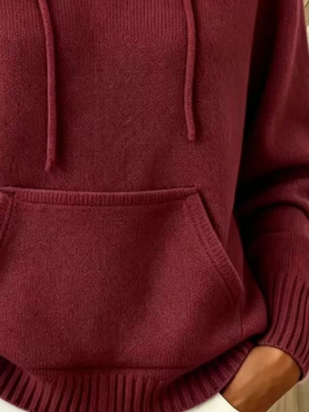 Women's Drawstring Kangaroo Pocket Hooded Sweater in burgundy — pocket detail view