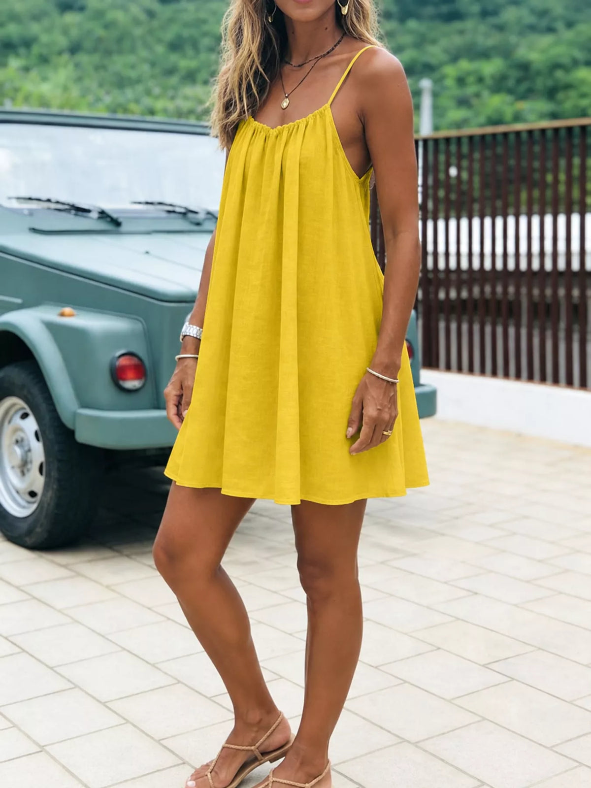Yellow spaghetti strap A-line mini dress with open tie back