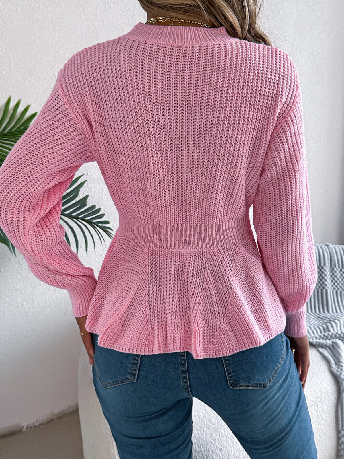 Cable Knit Peplum Sweater in pink, back view