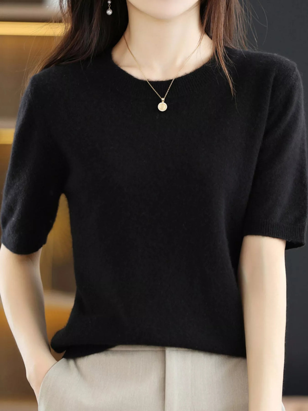 Black round neck short-sleeve sweater