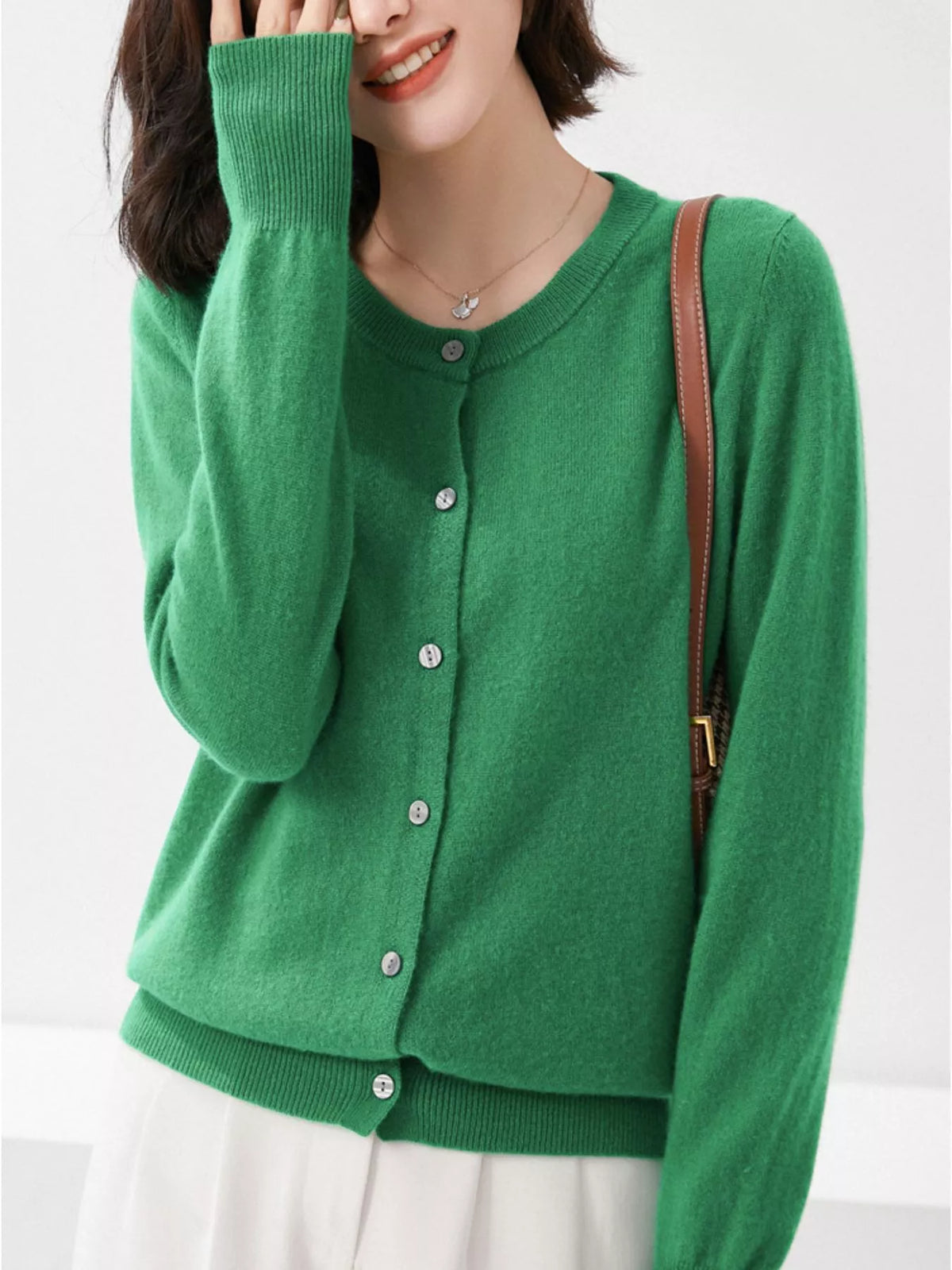 Green crew neck button-front cardigan