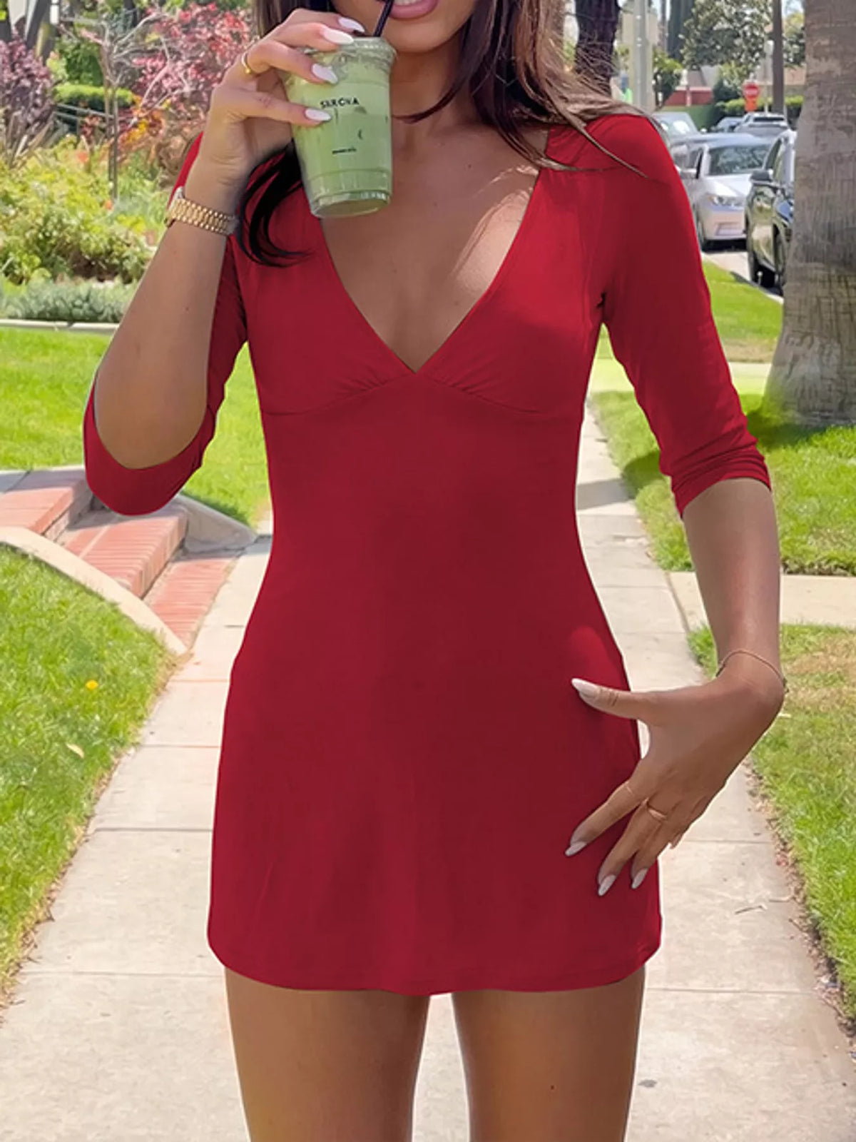 Plunging neck 3/4 sleeve mini dress, front view on model