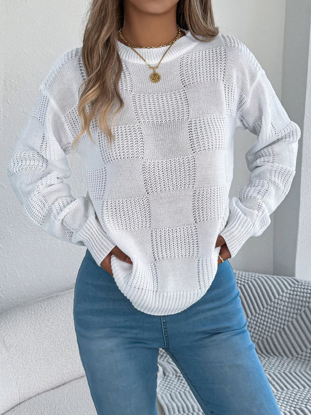 Gray checkerboard textured knit sweater
