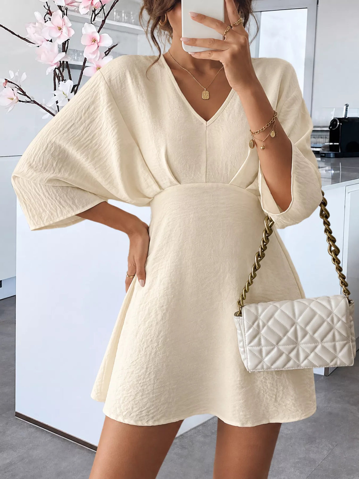 V-Neck Textured Mini Dress in beige