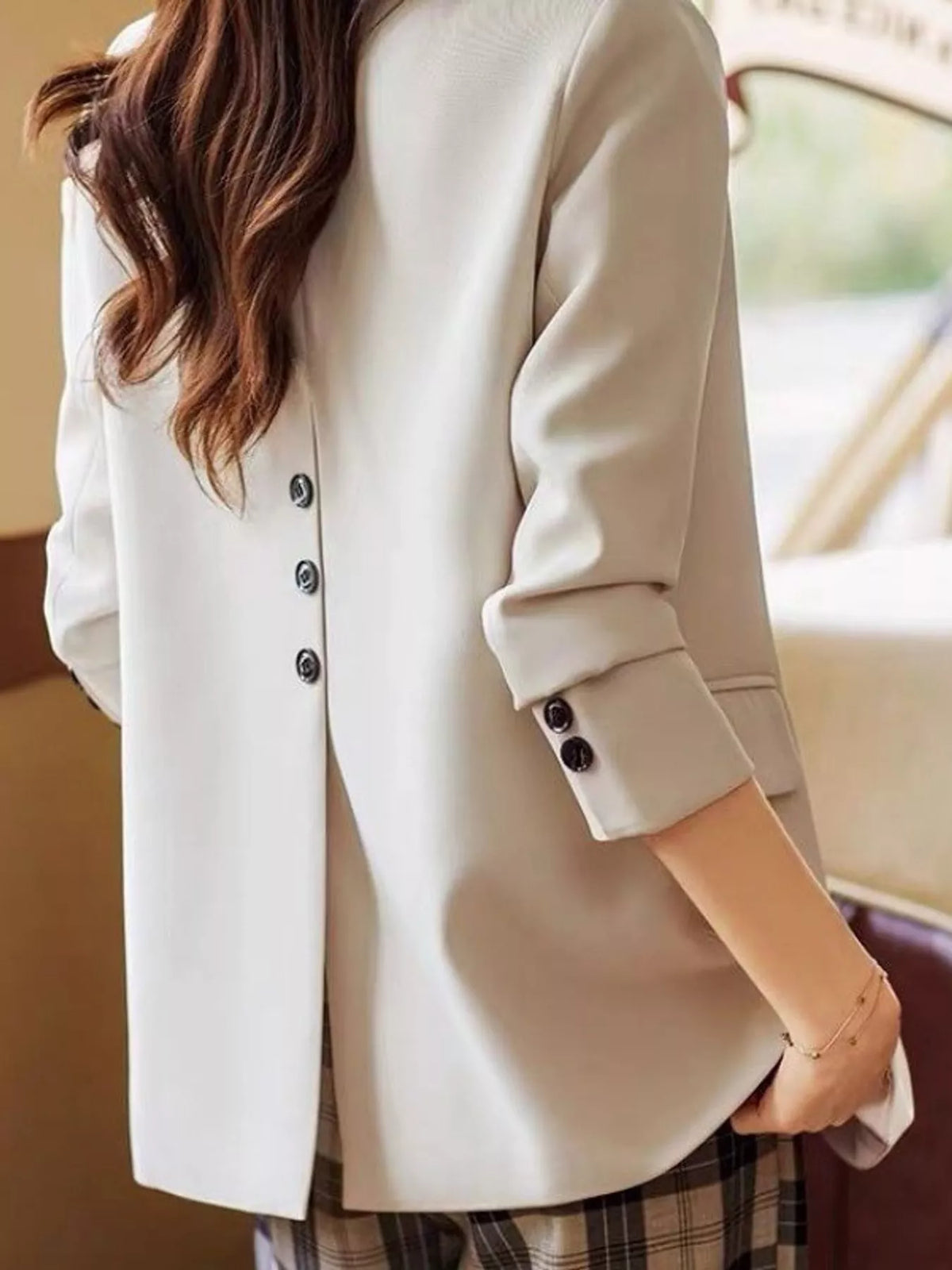 Collared long sleeve blazer, back view