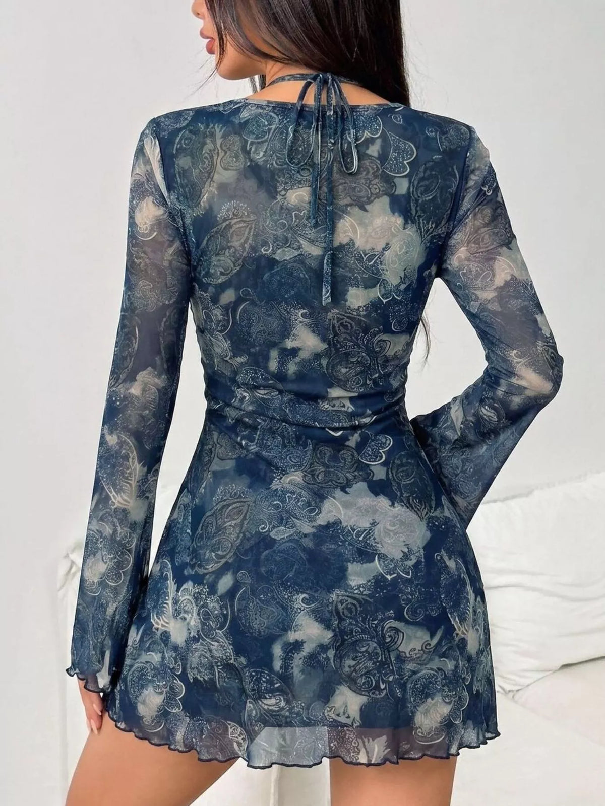 Blue floral mesh mini dress, back view