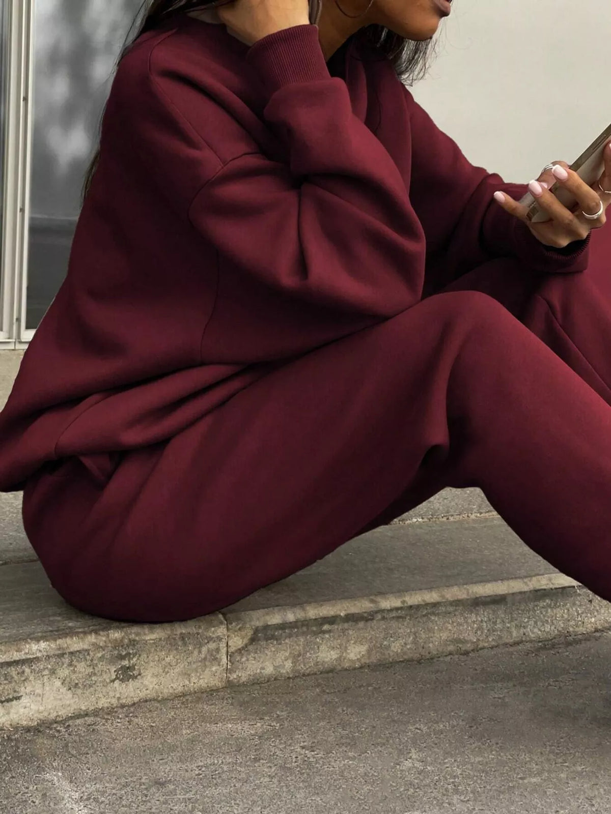Half-zip top and pants set, burgundy seated side