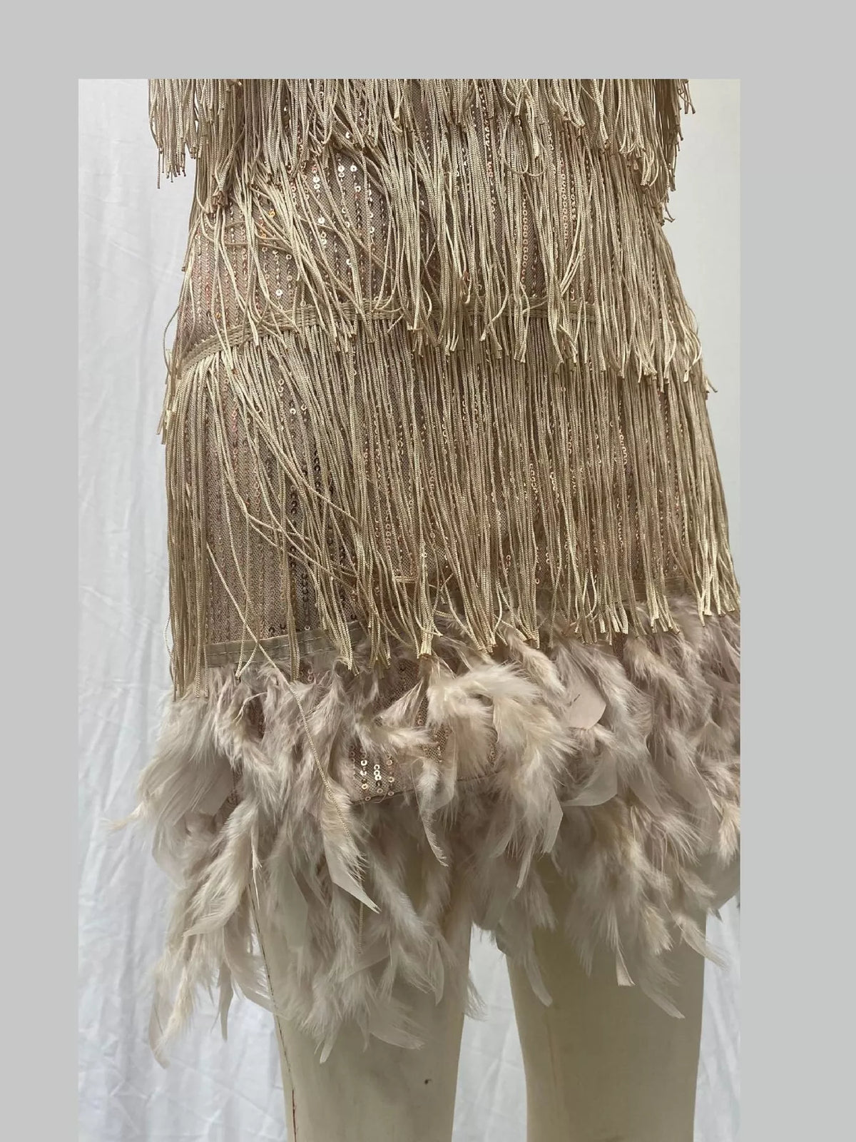 Gold feather fringe sequin mini dress, detail view
