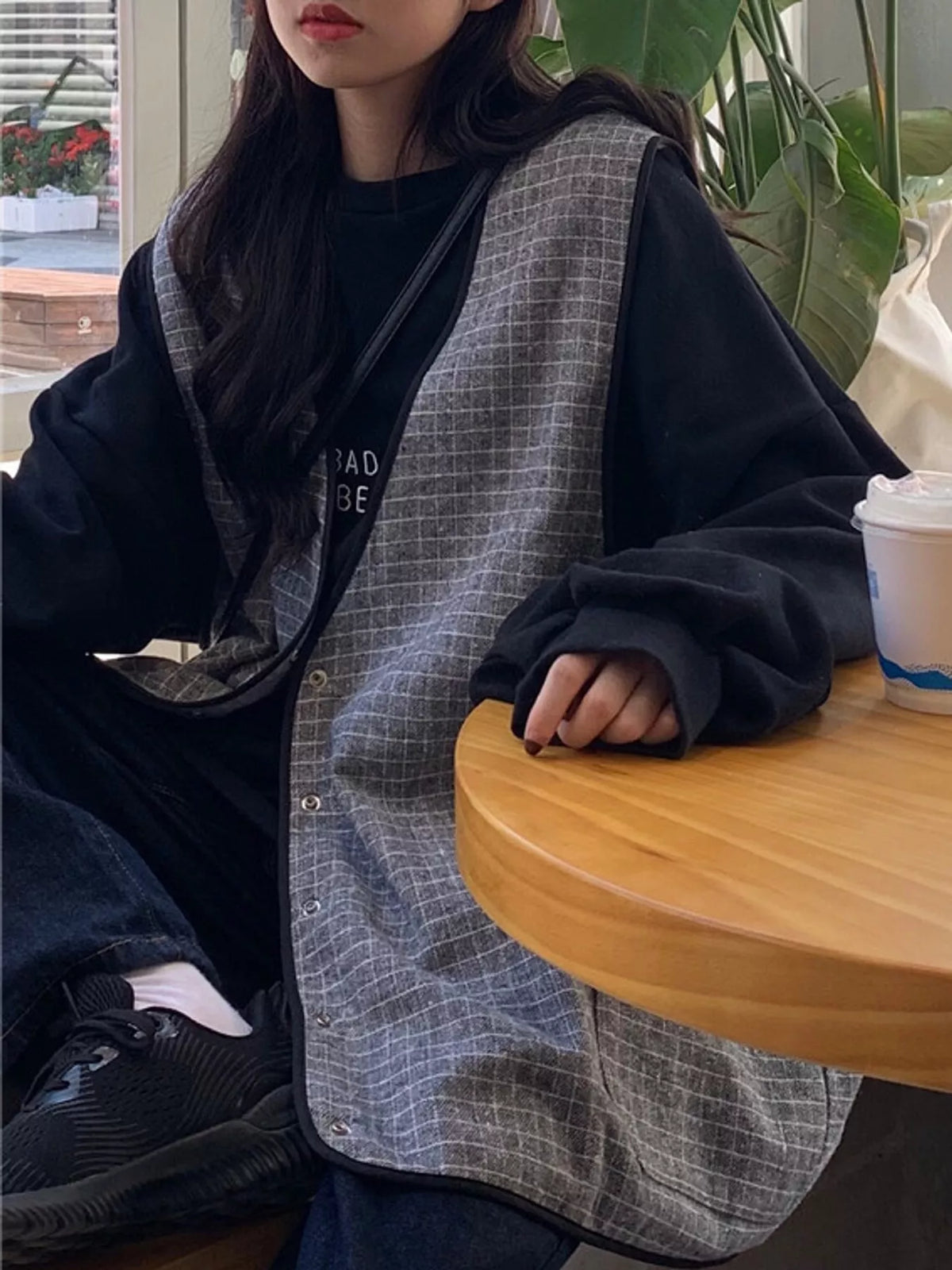 Letter-print sweatshirt, black layered outfit
