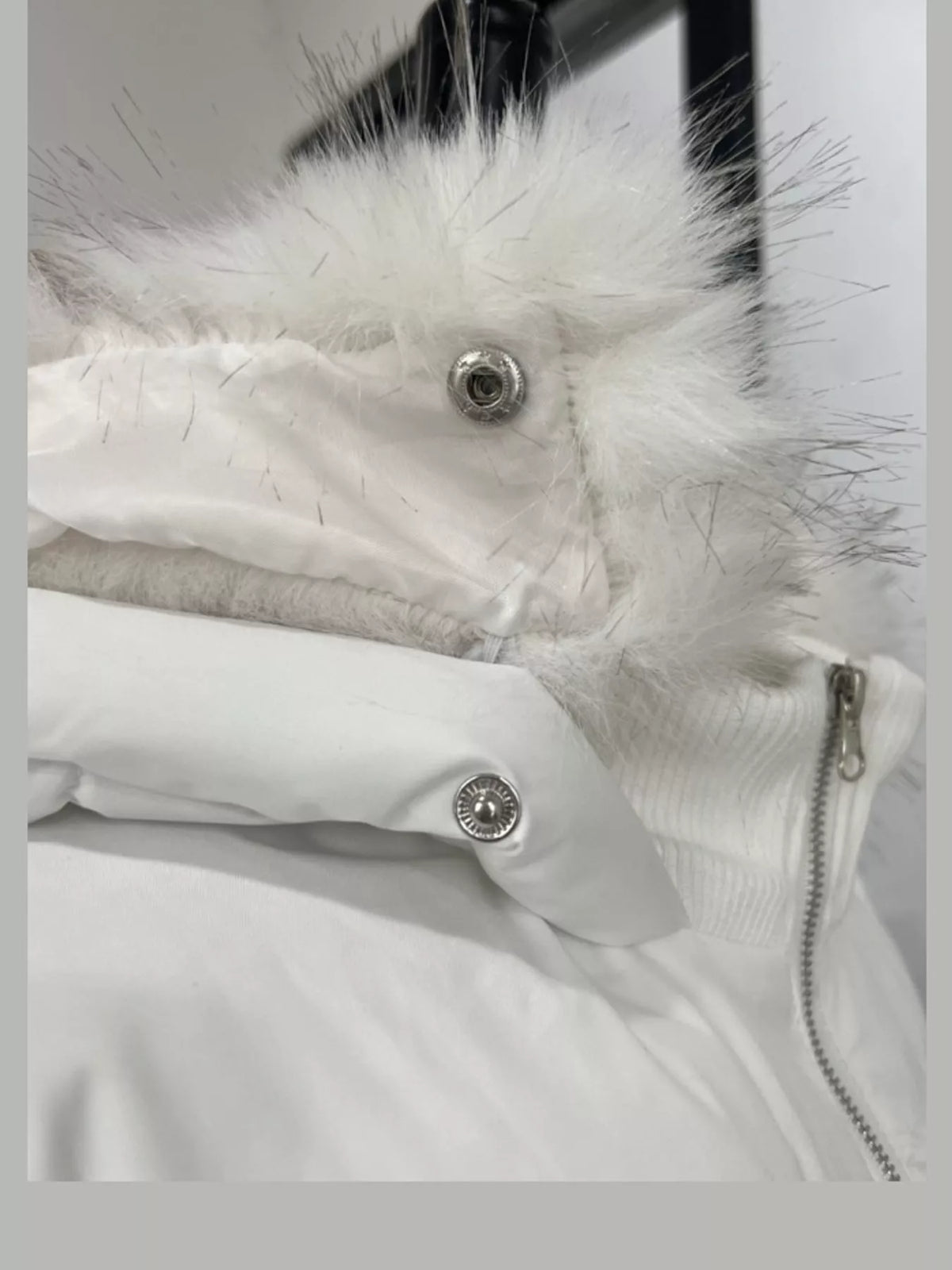Faux Fur Hooded Puffer Jacket — garment construction details