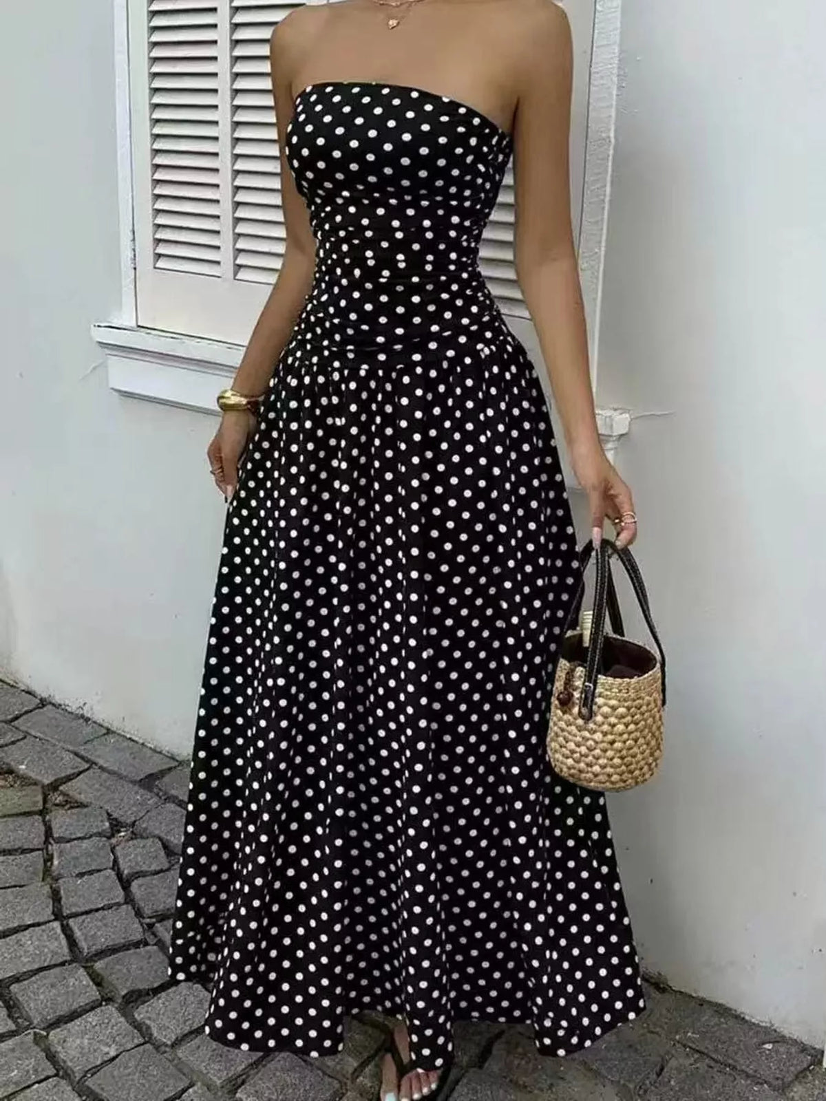 Women's Strapless Polka Dot Ruched Maxi Dress in black dots — front view