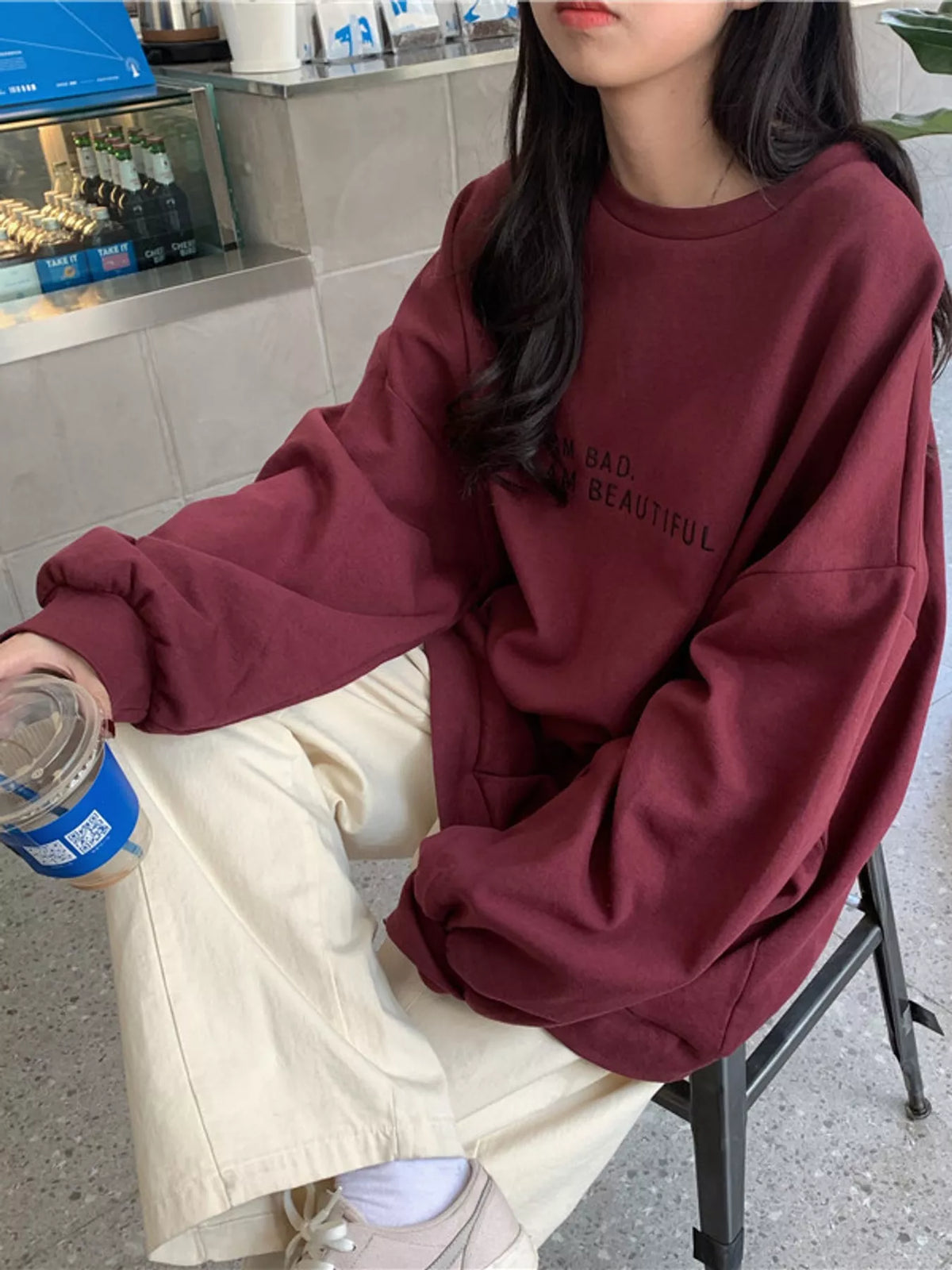 Letter-print sweatshirt, burgundy seated view