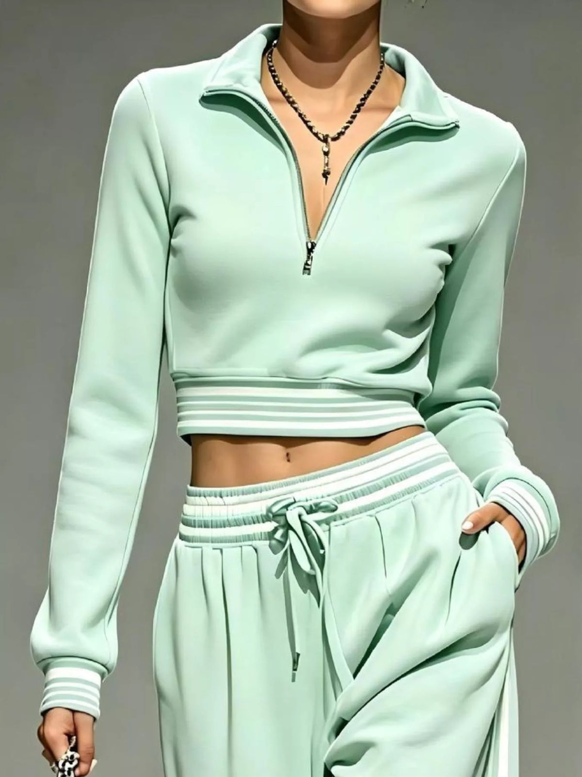 Green half-zip crop top and pants set, zip neckline and waist detail