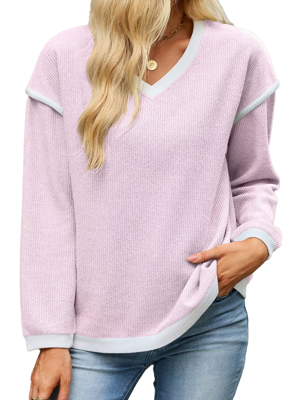 Pink contrast-trim V-neck sweater, neckline and hem view