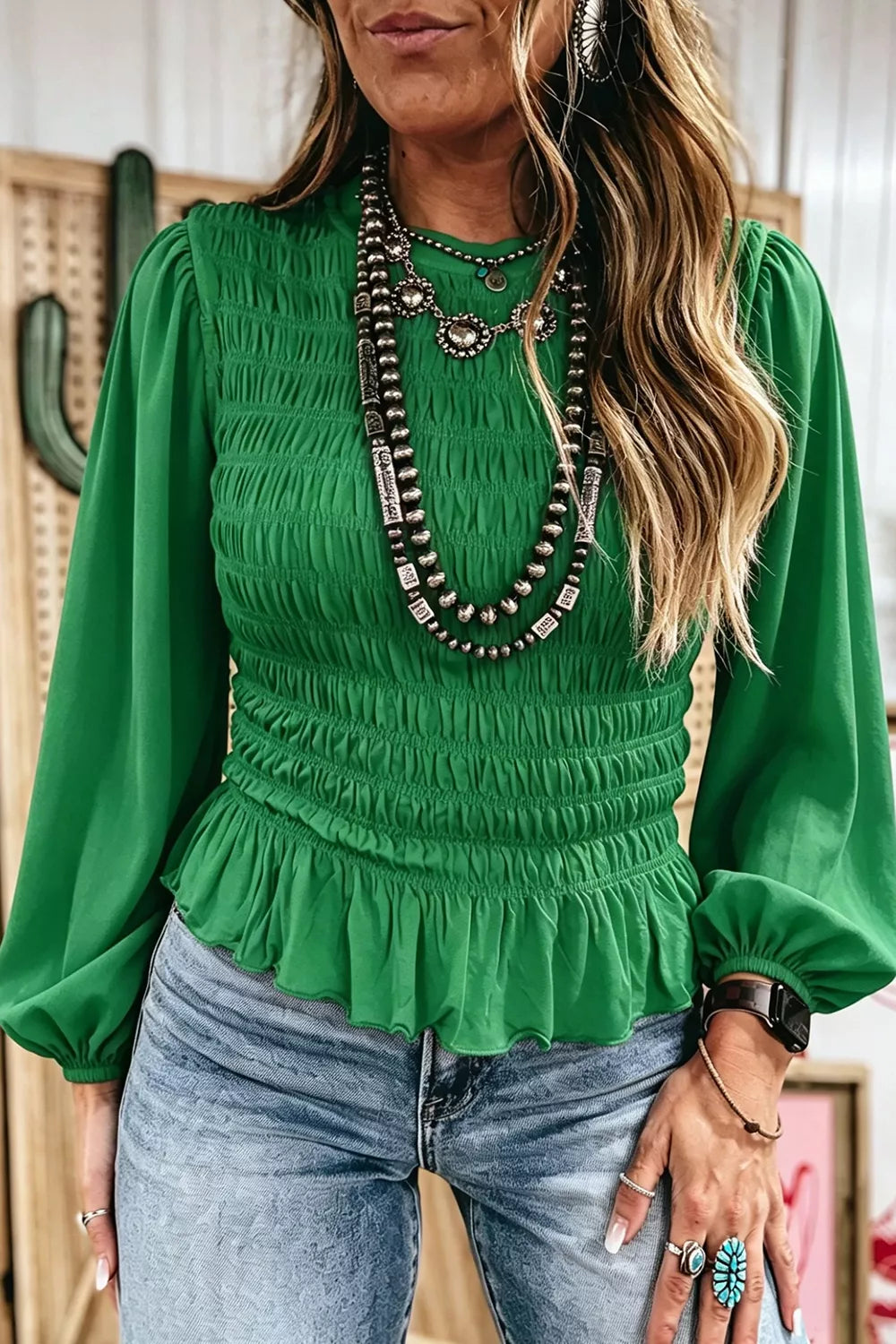 Smocked balloon-sleeve peplum blouse