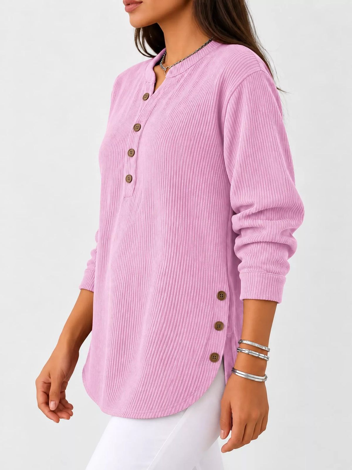 Pink button detail long sleeve top, side view