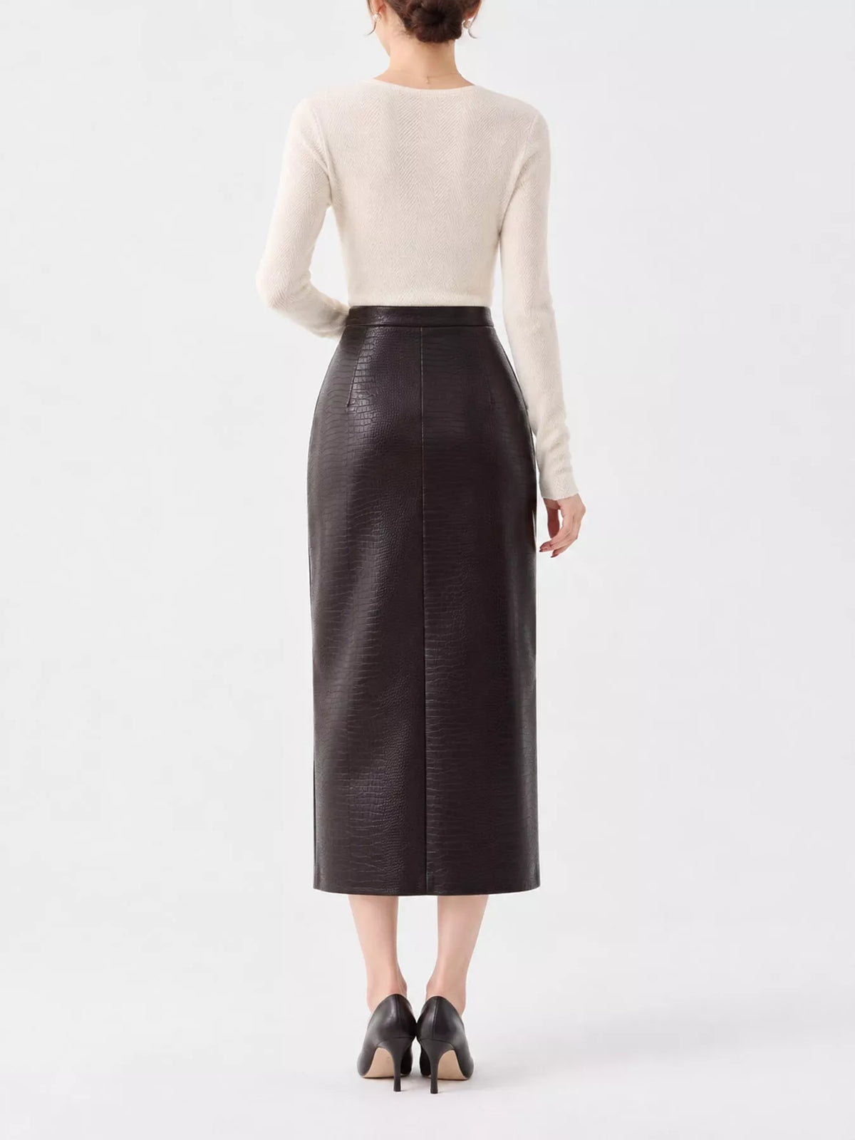 Cream herringbone knit sweater, back view