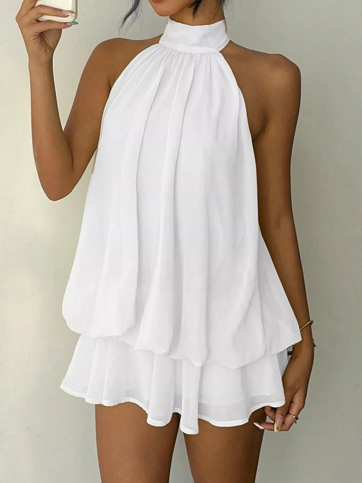 White halter neck layered mini dress, front styled view