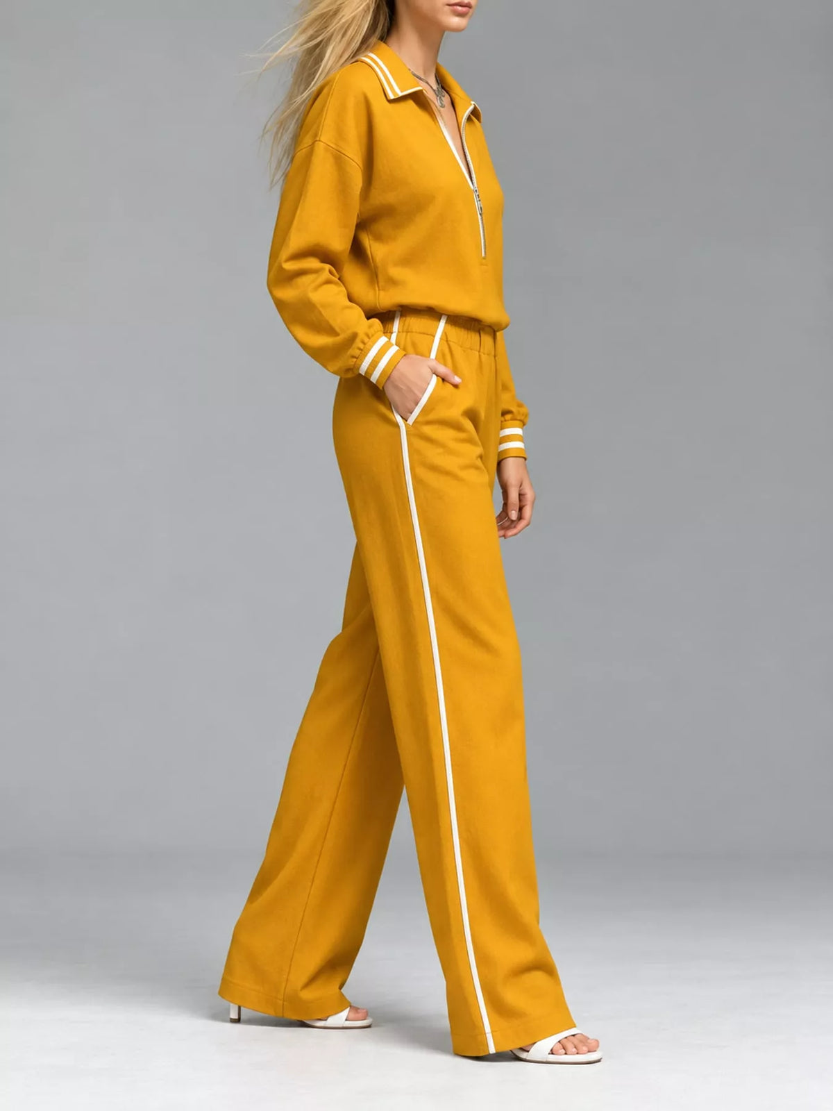 Yellow striped half zip top and pants set, side view