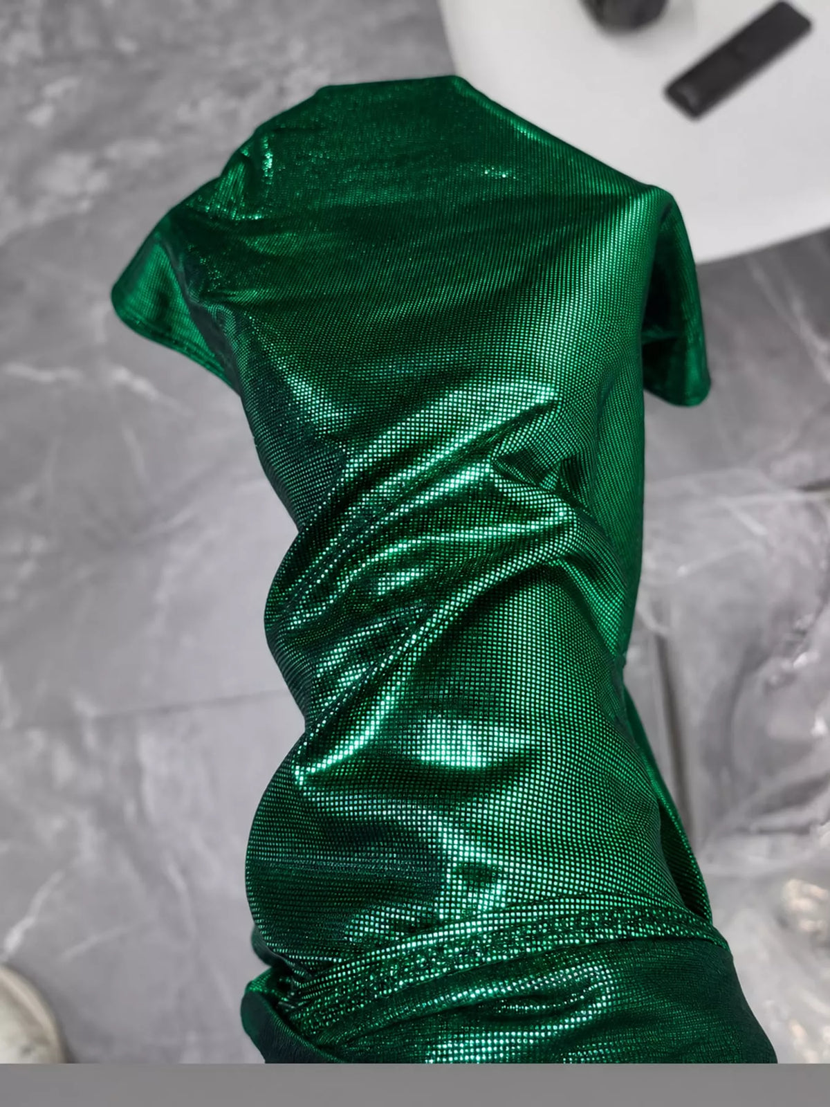 Green halter neck slit mini dress, detail view