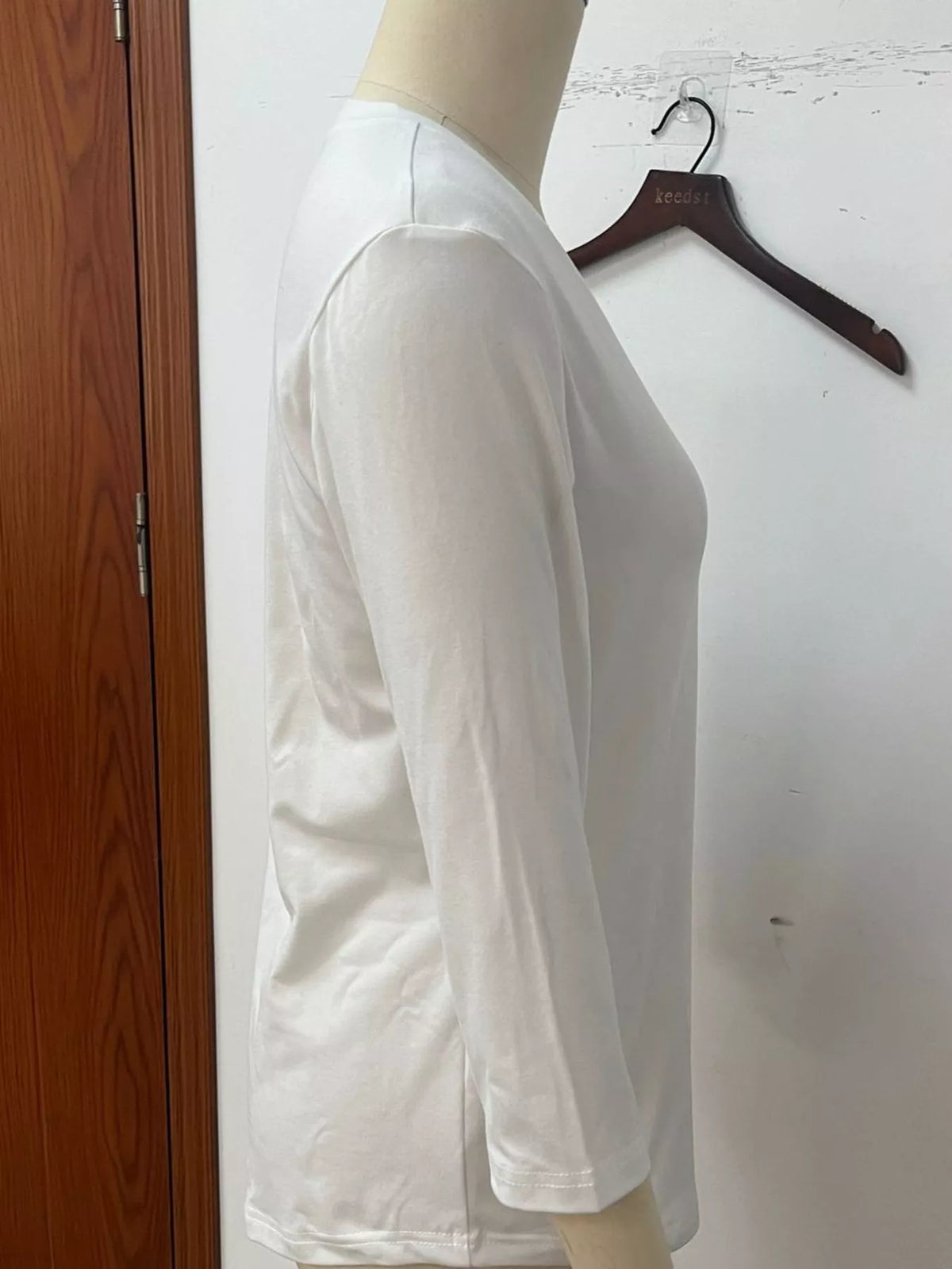 White v-neck half sleeve t-shirt, detail view